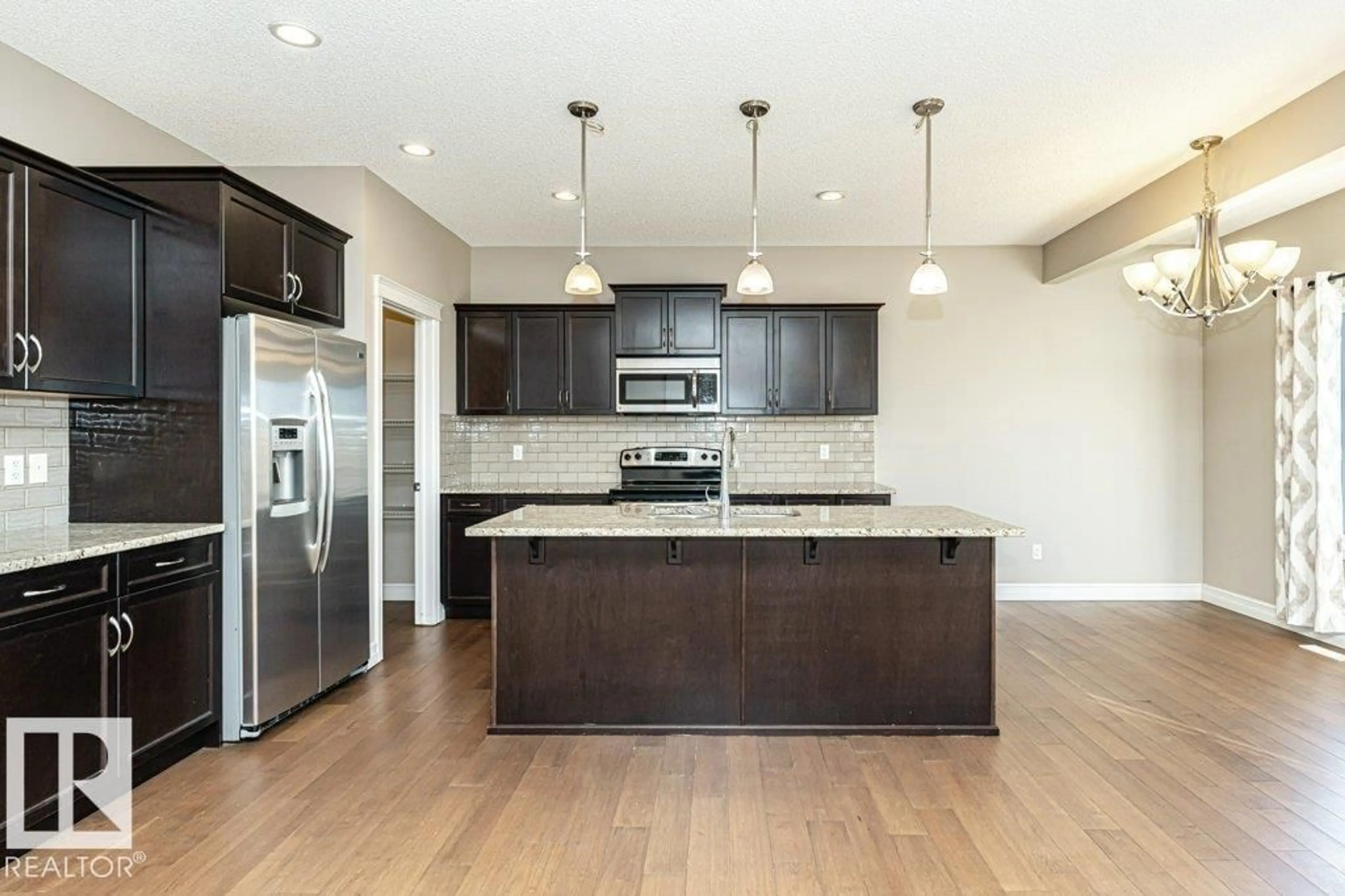 Open concept kitchen, unknown for NW - 1920 33B ST, Edmonton Alberta T6T0L3