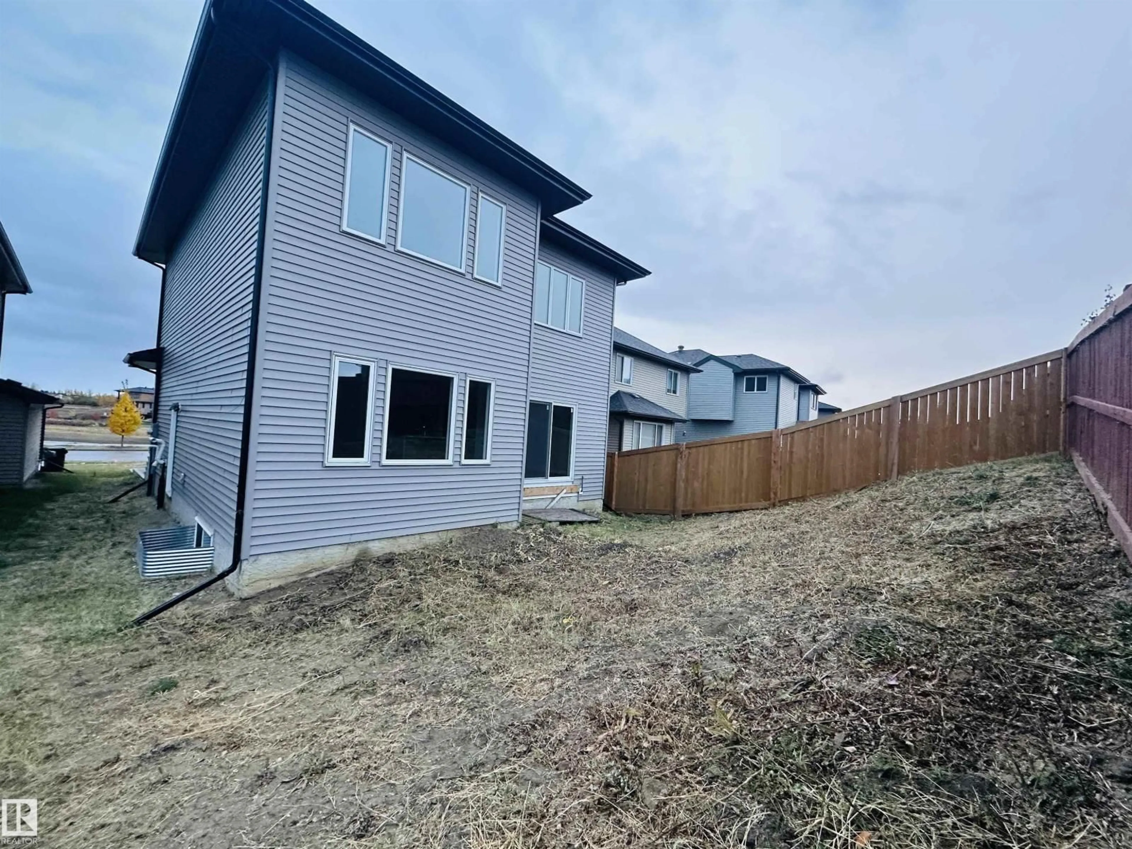 A pic from outside/outdoor area/front of a property/back of a property/a pic from drone, unknown for 22 TIMBRE WY, Spruce Grove Alberta T7X0A7