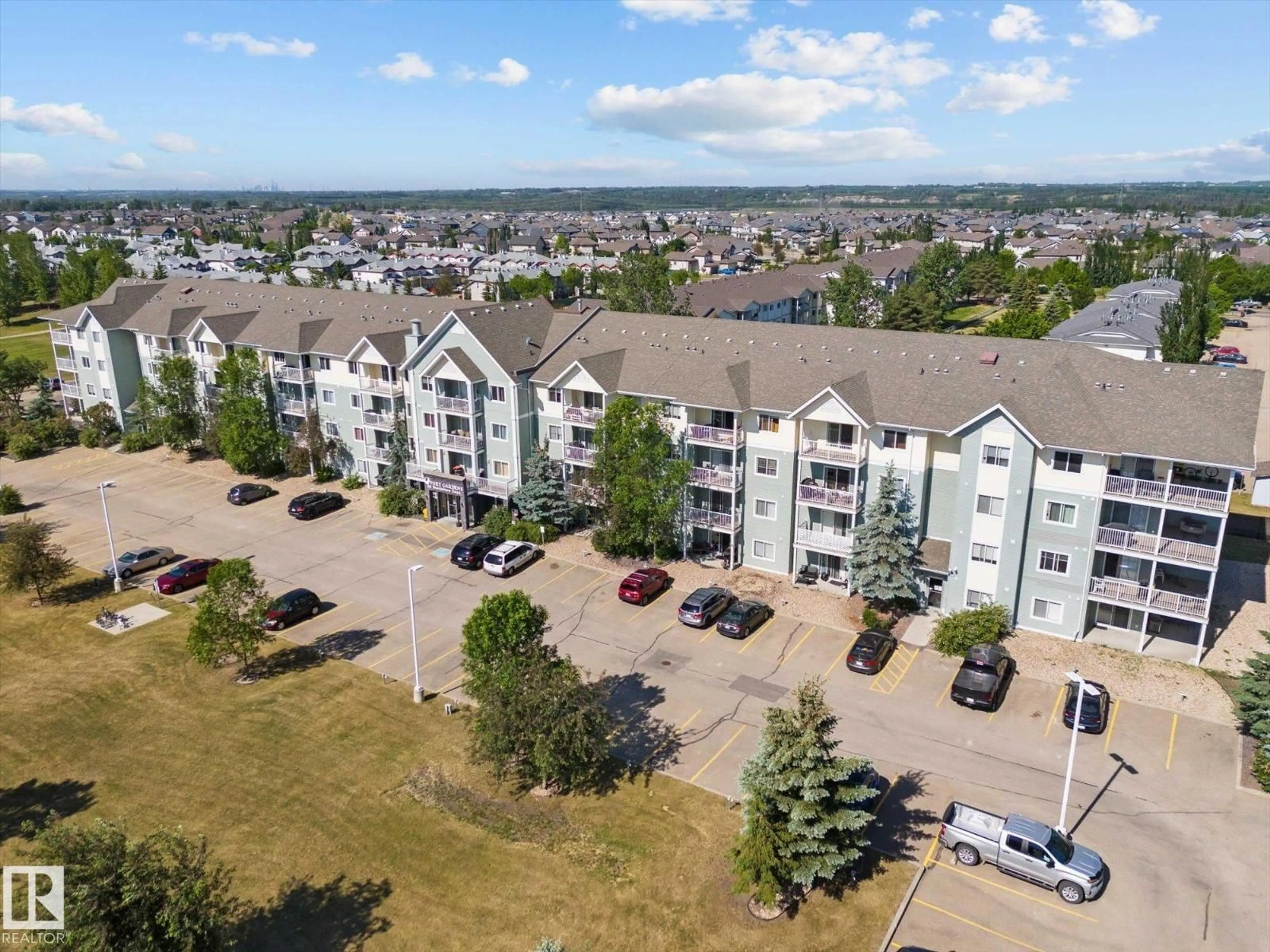 A pic from outside/outdoor area/front of a property/back of a property/a pic from drone, unknown for 50 WOODSMERE, Fort Saskatchewan Alberta T8L4N9