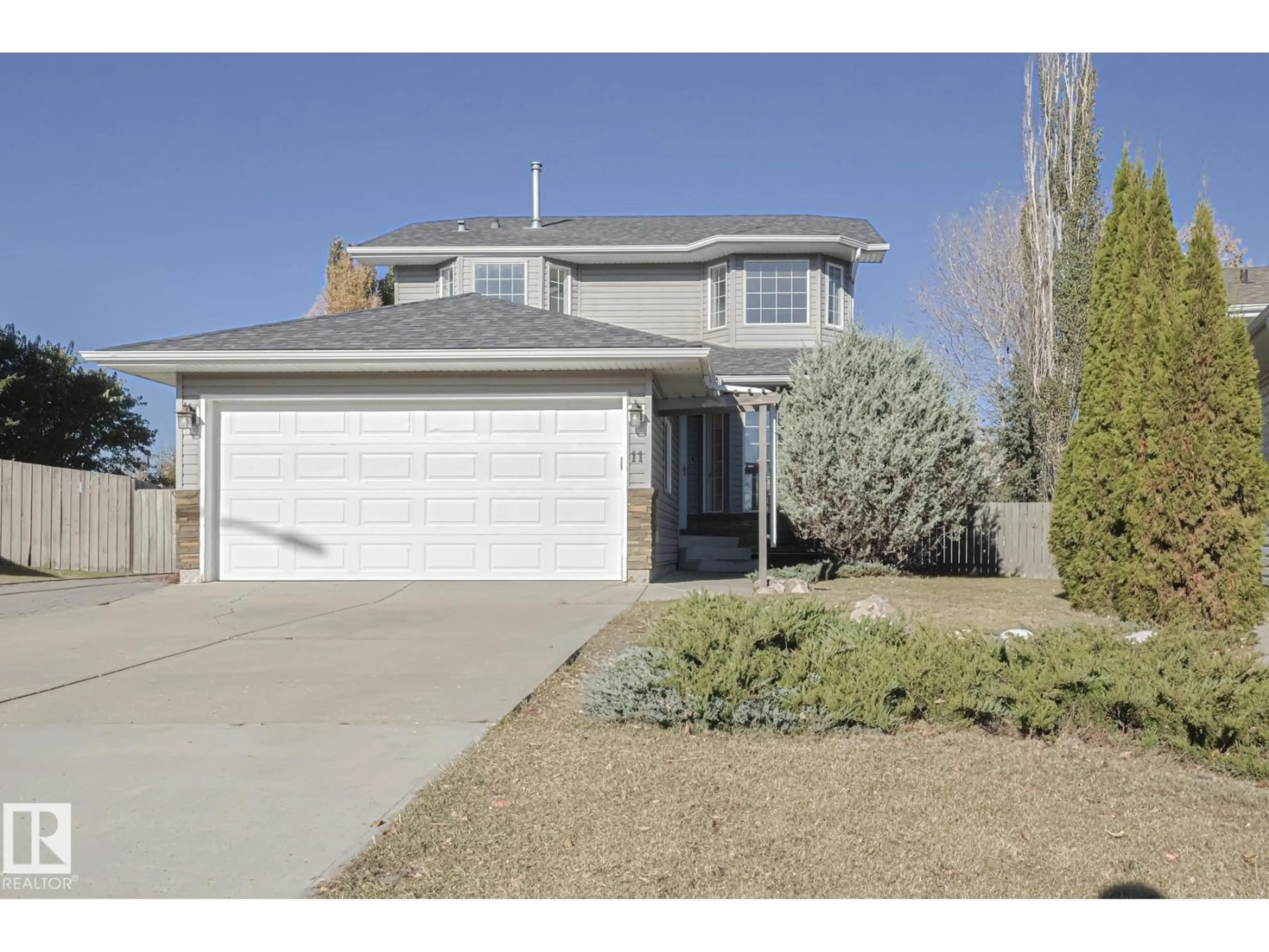 Home with vinyl exterior material, street for 11 HIGH PARK CL, Stony Plain Alberta T7Z1L9