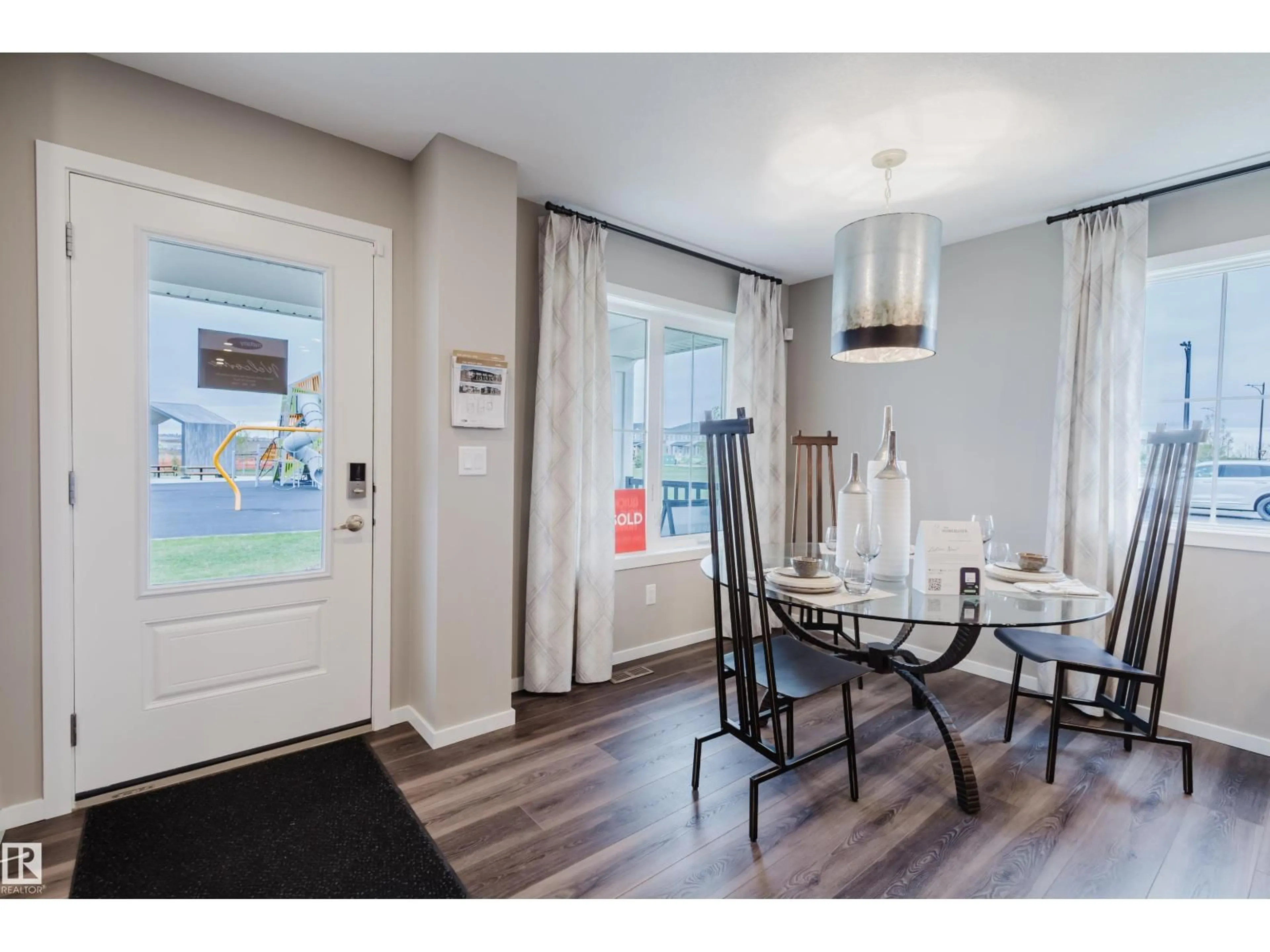 Dining room, wood/laminate floor for 1029 HELEN LAVENDER LN, Sherwood Park Alberta T8H3A4