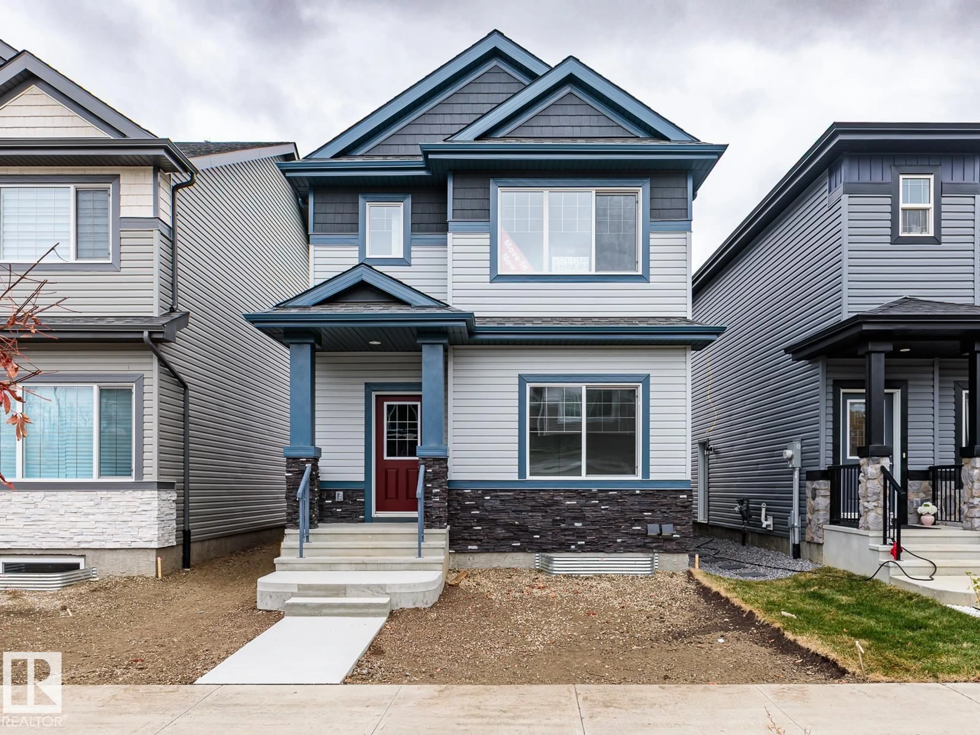 Home with vinyl exterior material, street for 6324 175 AV, Edmonton Alberta T5Y4H2