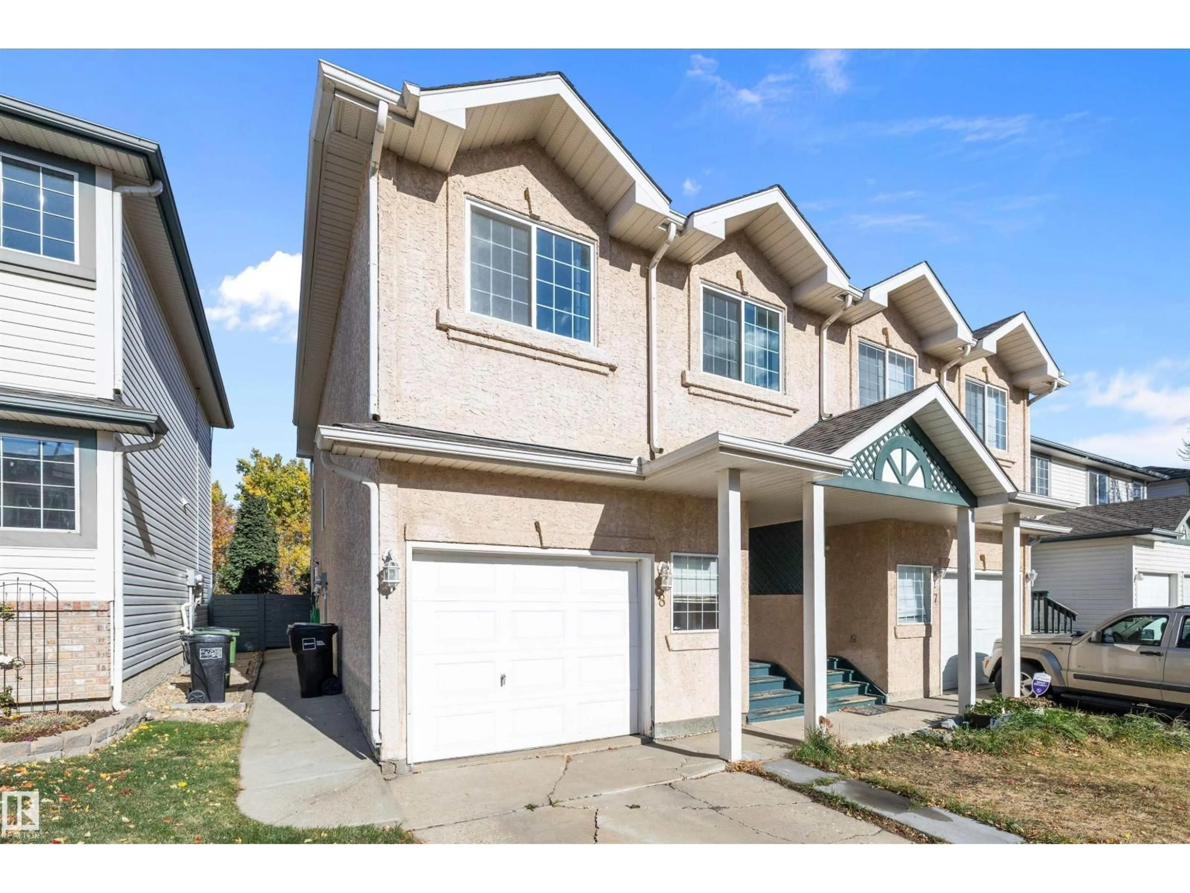 Home with vinyl exterior material, street for #8 - 300 HOOPER CR, Edmonton Alberta T5A5B3