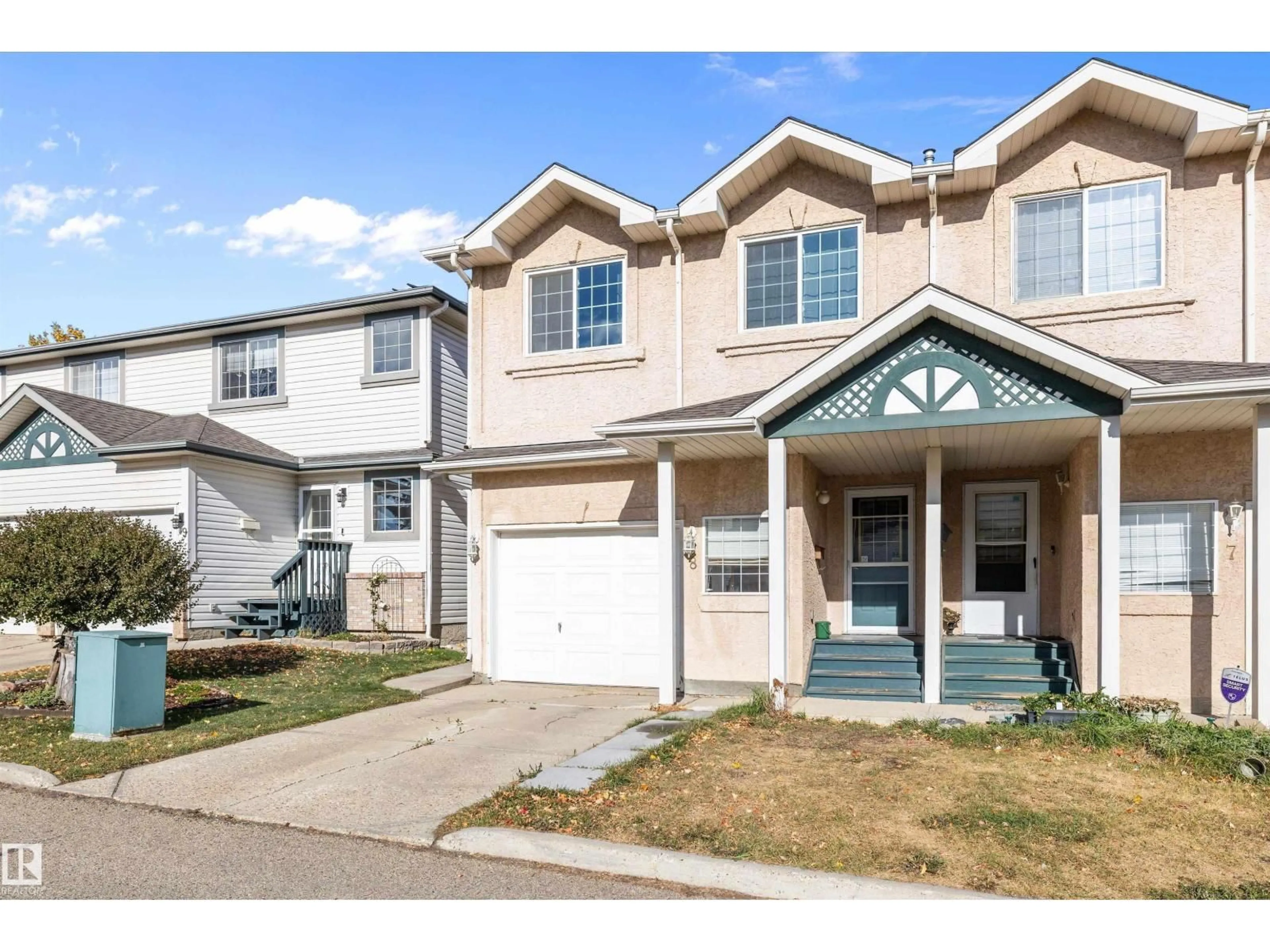 Home with vinyl exterior material, street for #8 - 300 HOOPER CR, Edmonton Alberta T5A5B3