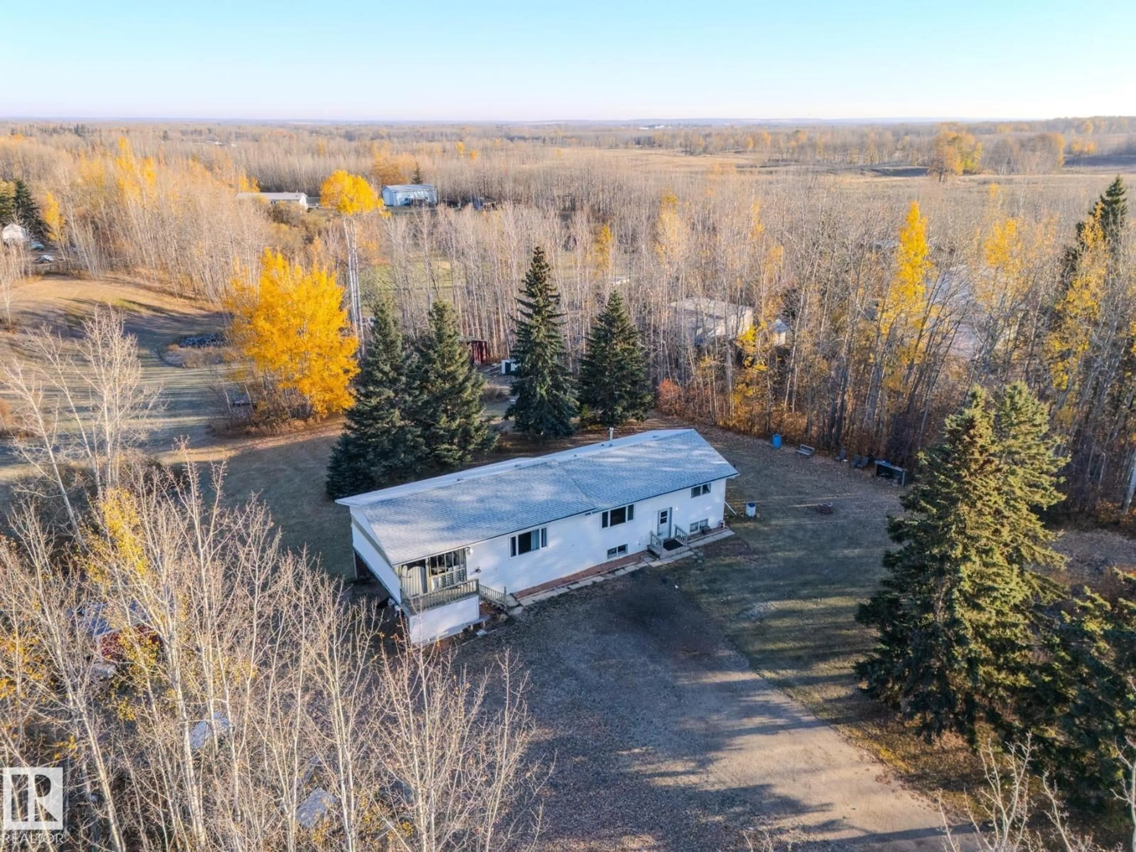 A pic from outside/outdoor area/front of a property/back of a property/a pic from drone, unknown for #4 - 54222 RGE ROAD 25, Rural Lac Ste. Anne County Alberta T0E0A0