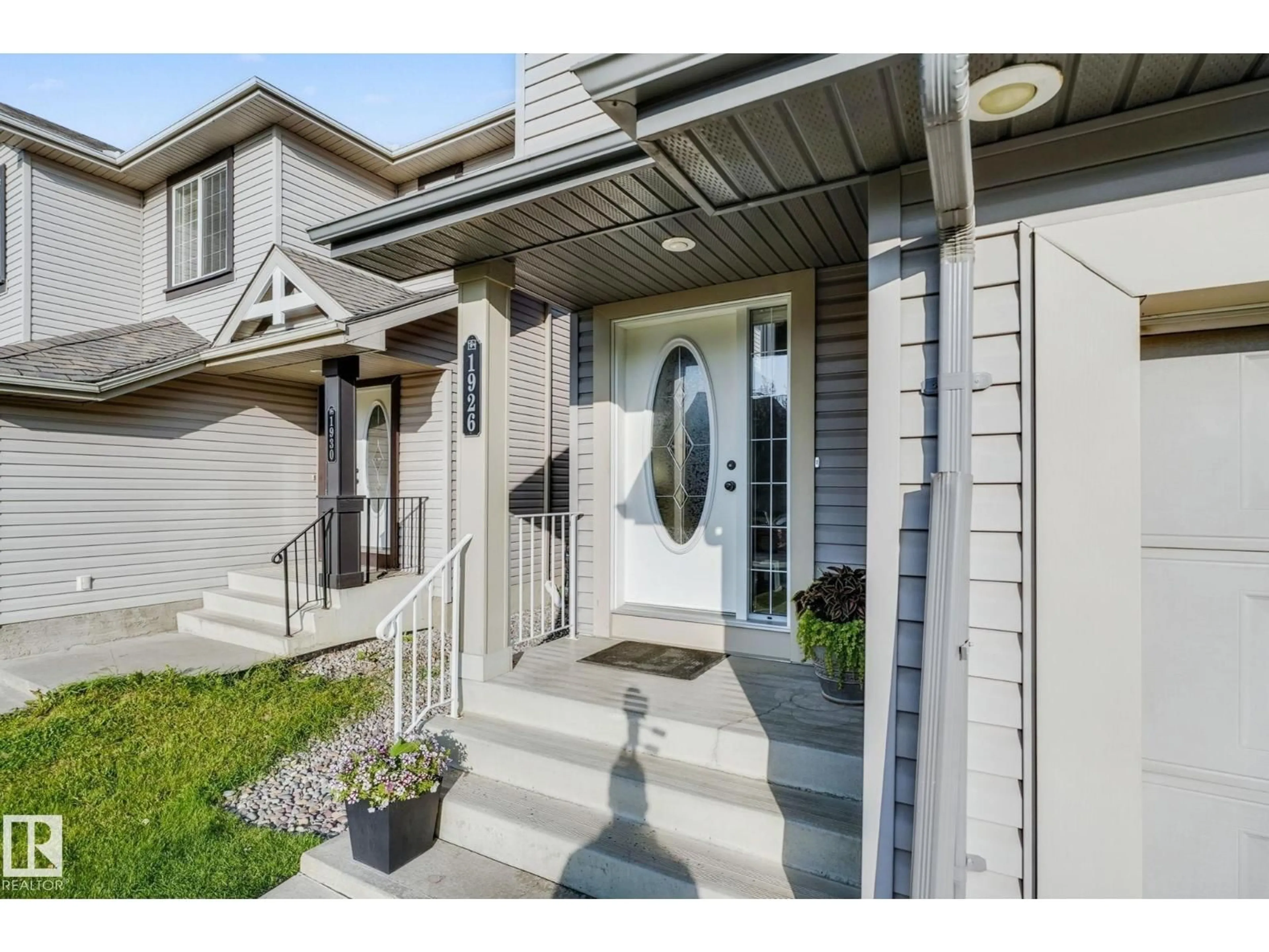 Home with vinyl exterior material, street for SW - 1926 119A ST, Edmonton Alberta T6W0E2