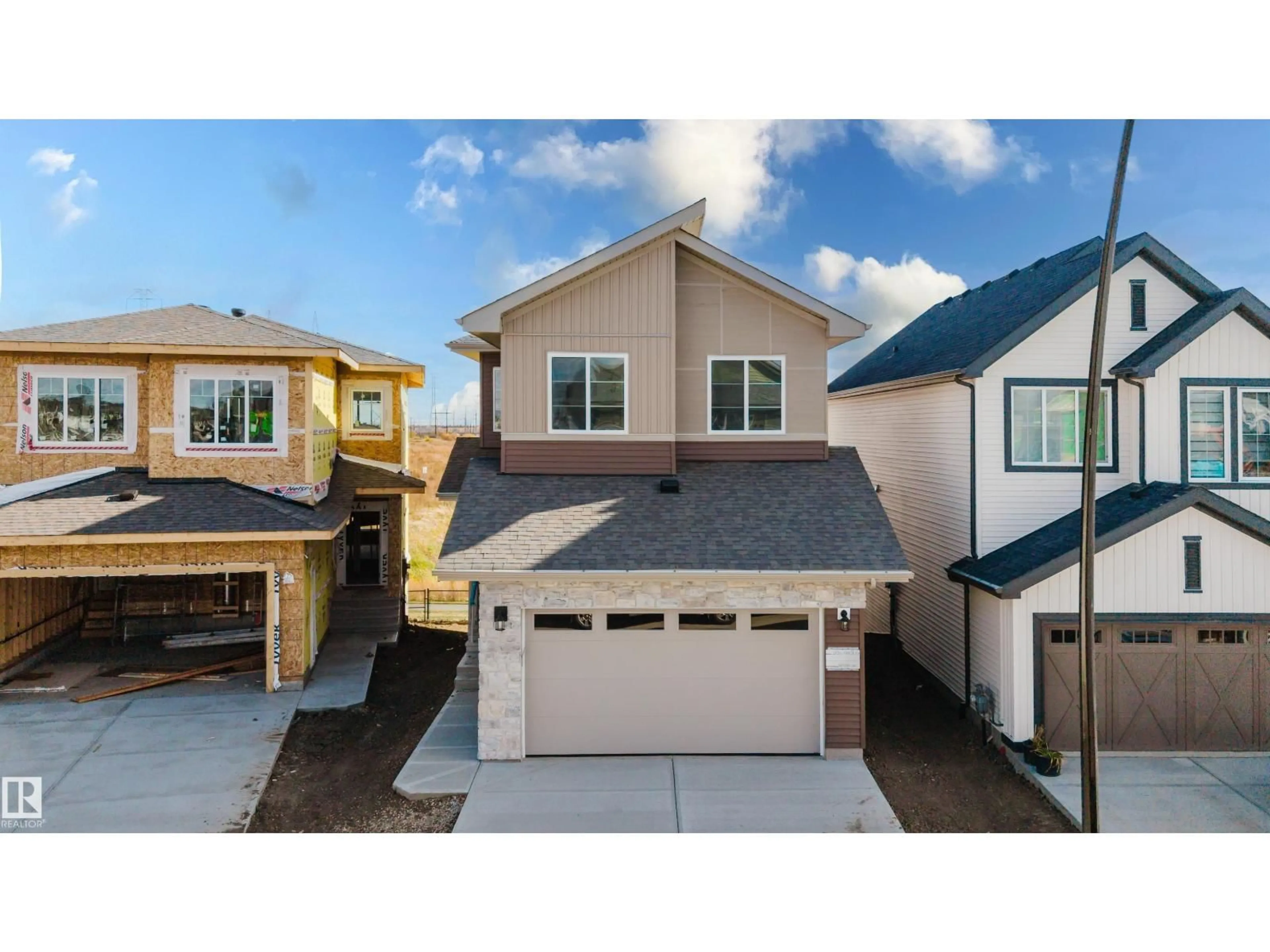 Home with vinyl exterior material, street for NW - 2803 188 ST, Edmonton Alberta T6M3J1