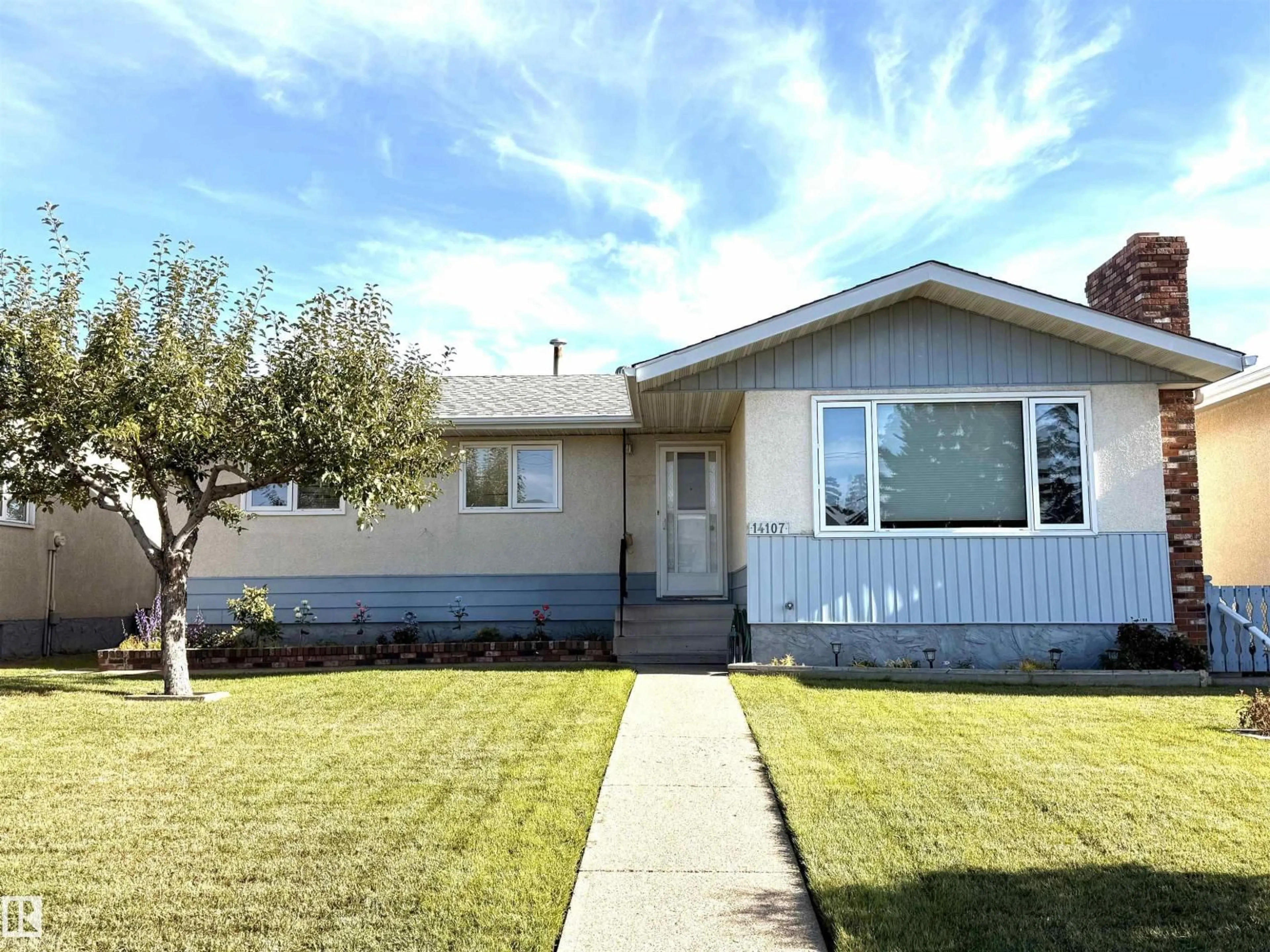 Home with vinyl exterior material, street for NW - 14107 96 ST, Edmonton Alberta T5E5Z3