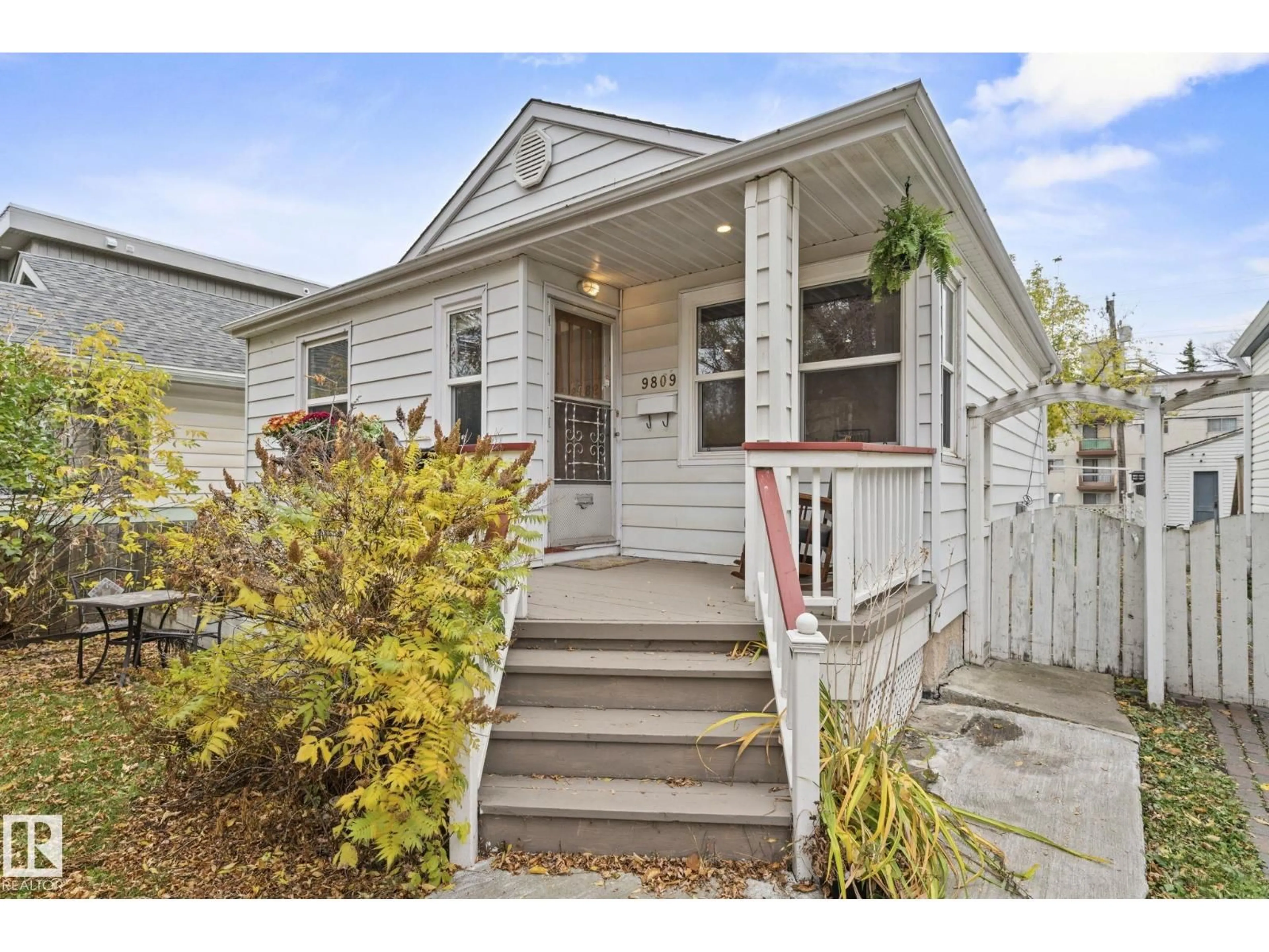 Home with vinyl exterior material, street for NW - 9809 83 AV, Edmonton Alberta T6E2B8
