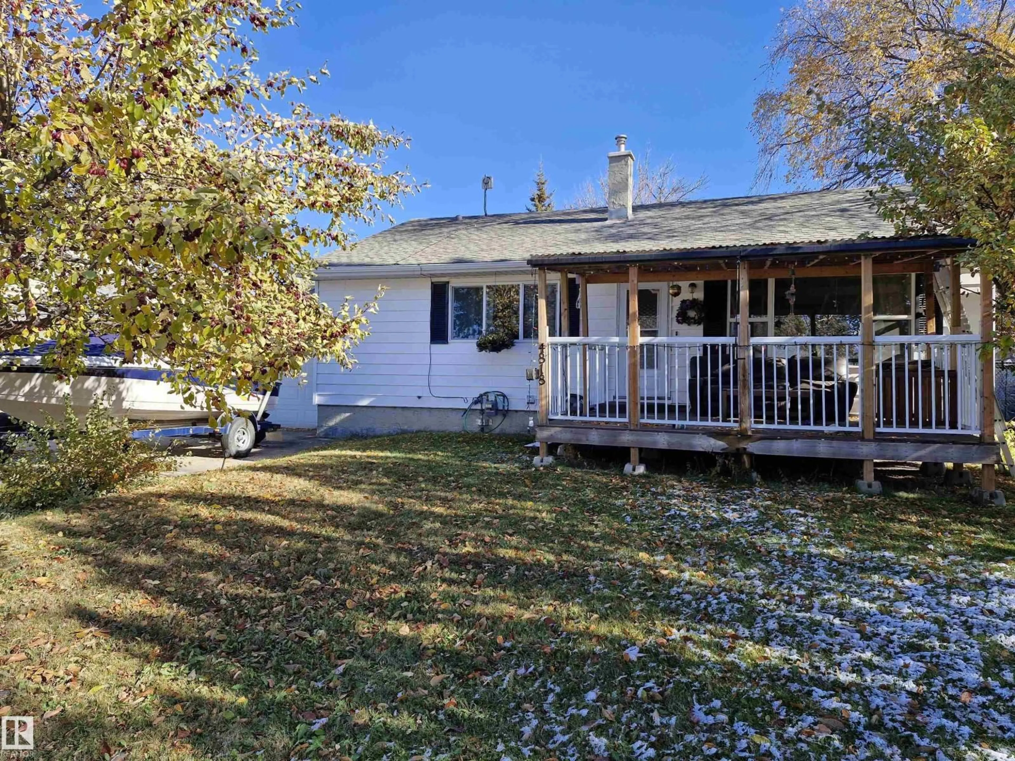 A pic from outside/outdoor area/front of a property/back of a property/a pic from drone, street for 4818 32 ST, Rural Wetaskiwin County Alberta T0C2V0