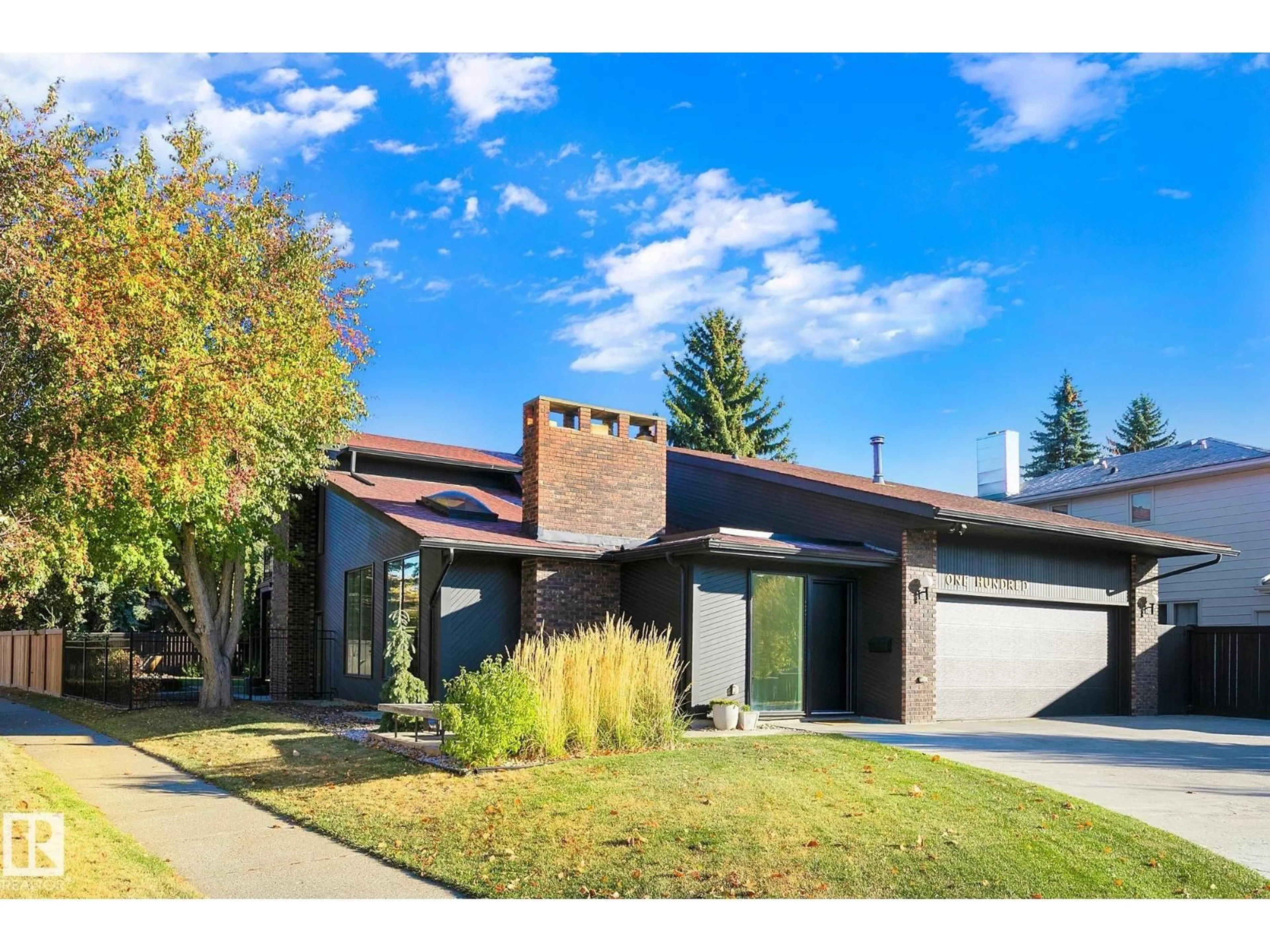 Home with brick exterior material, street for 100 WOLF WILLOW CR, Edmonton Alberta T5T1T2