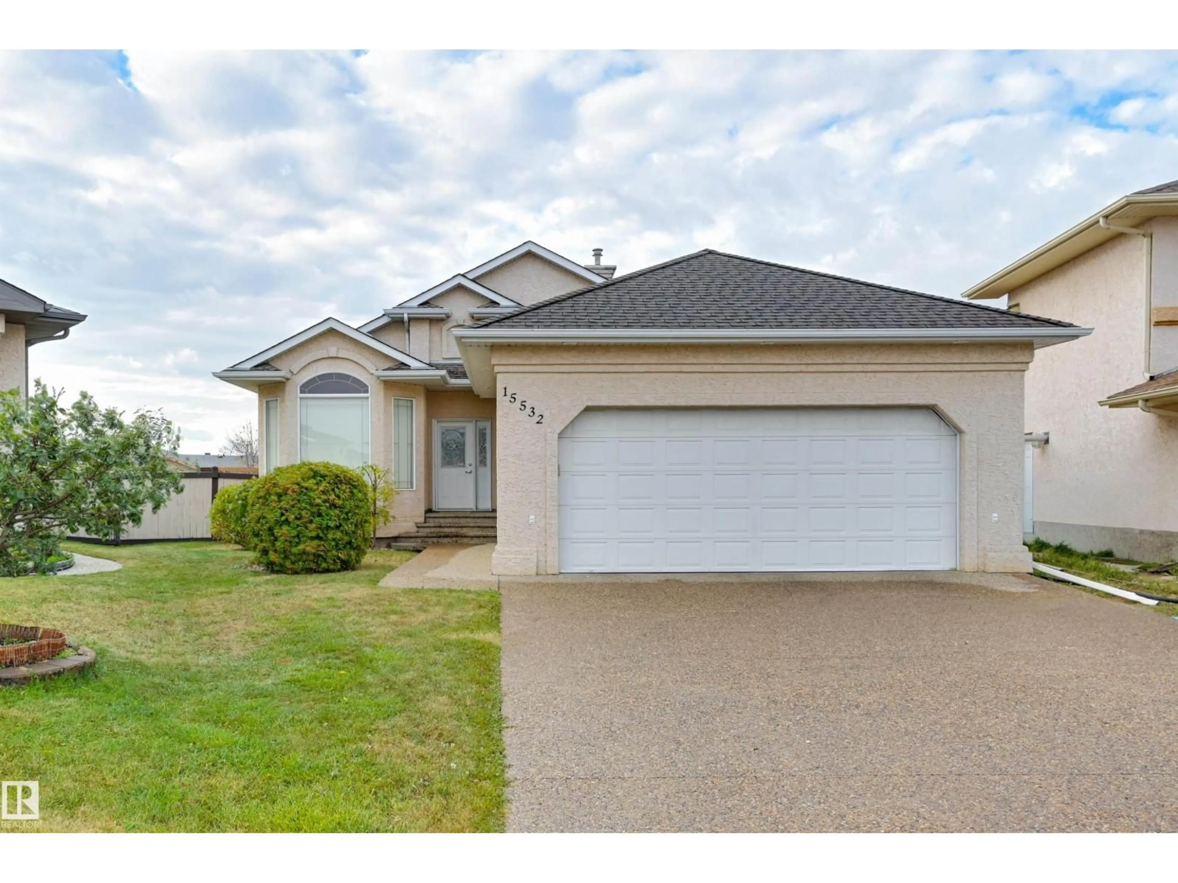 Home with vinyl exterior material, street for NW - 15532 103 ST, Edmonton Alberta T5X6B3