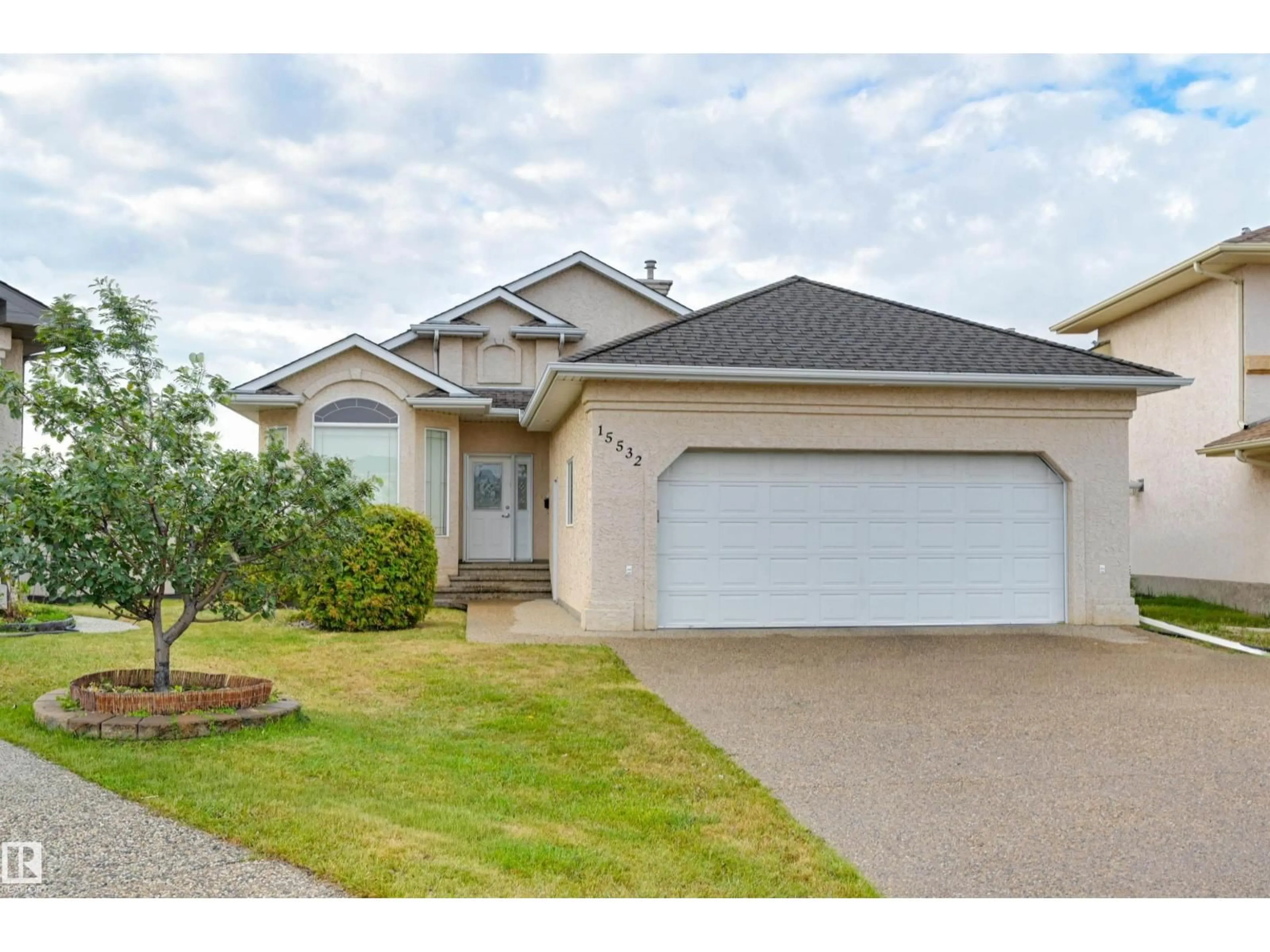 Home with vinyl exterior material, street for NW - 15532 103 ST, Edmonton Alberta T5X6B3