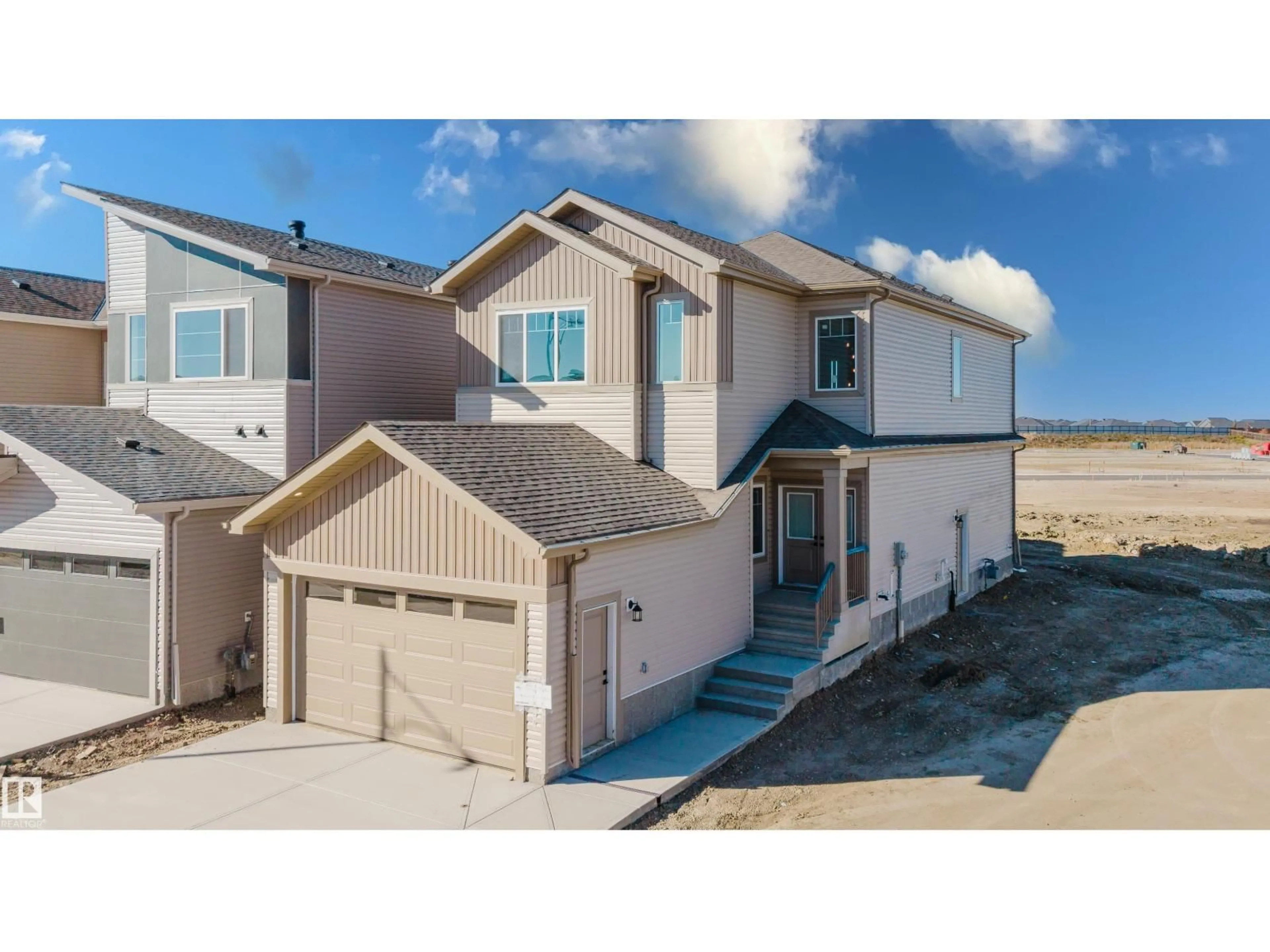 Home with vinyl exterior material, street for 343 MUNN WY, Leduc Alberta T9E0S9