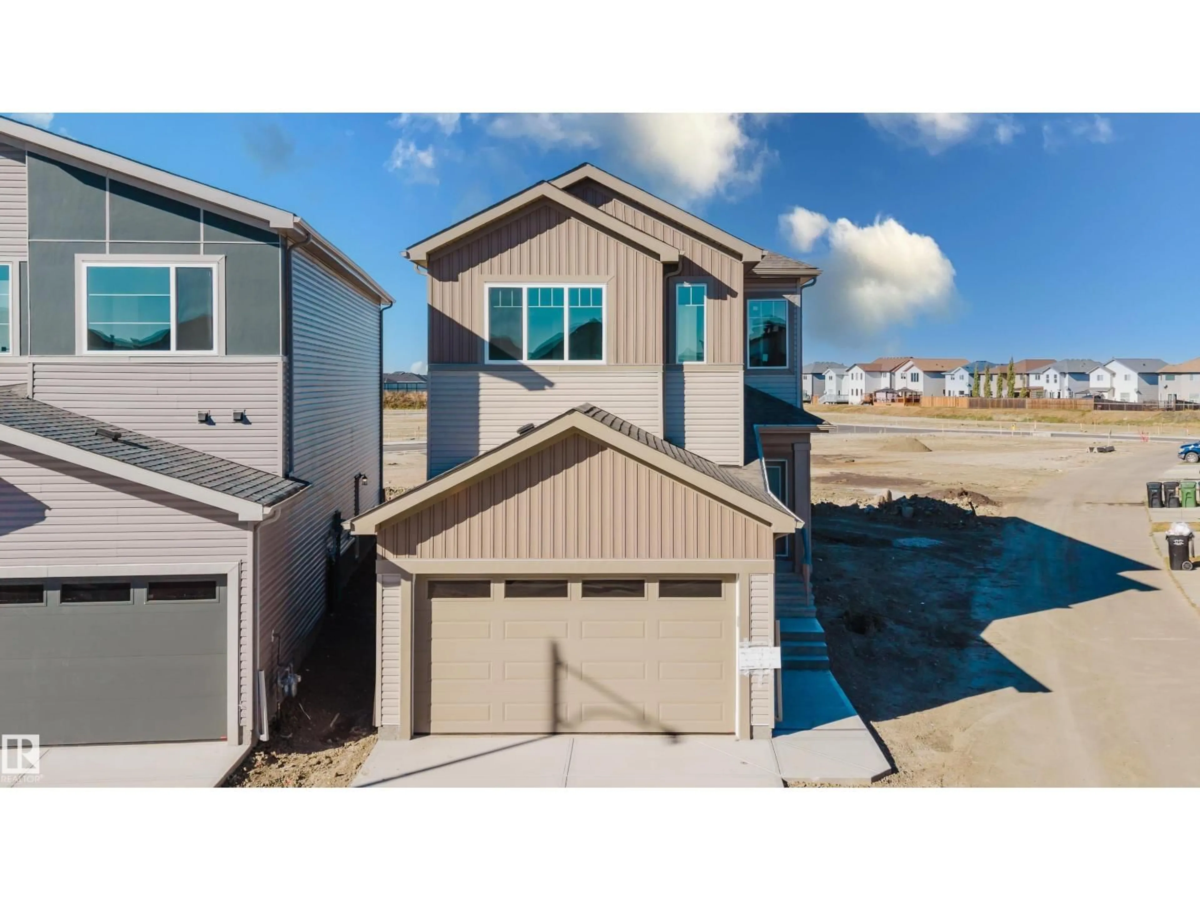 Home with vinyl exterior material, water/lake/river/ocean view for 343 MUNN WY, Leduc Alberta T9E0S9