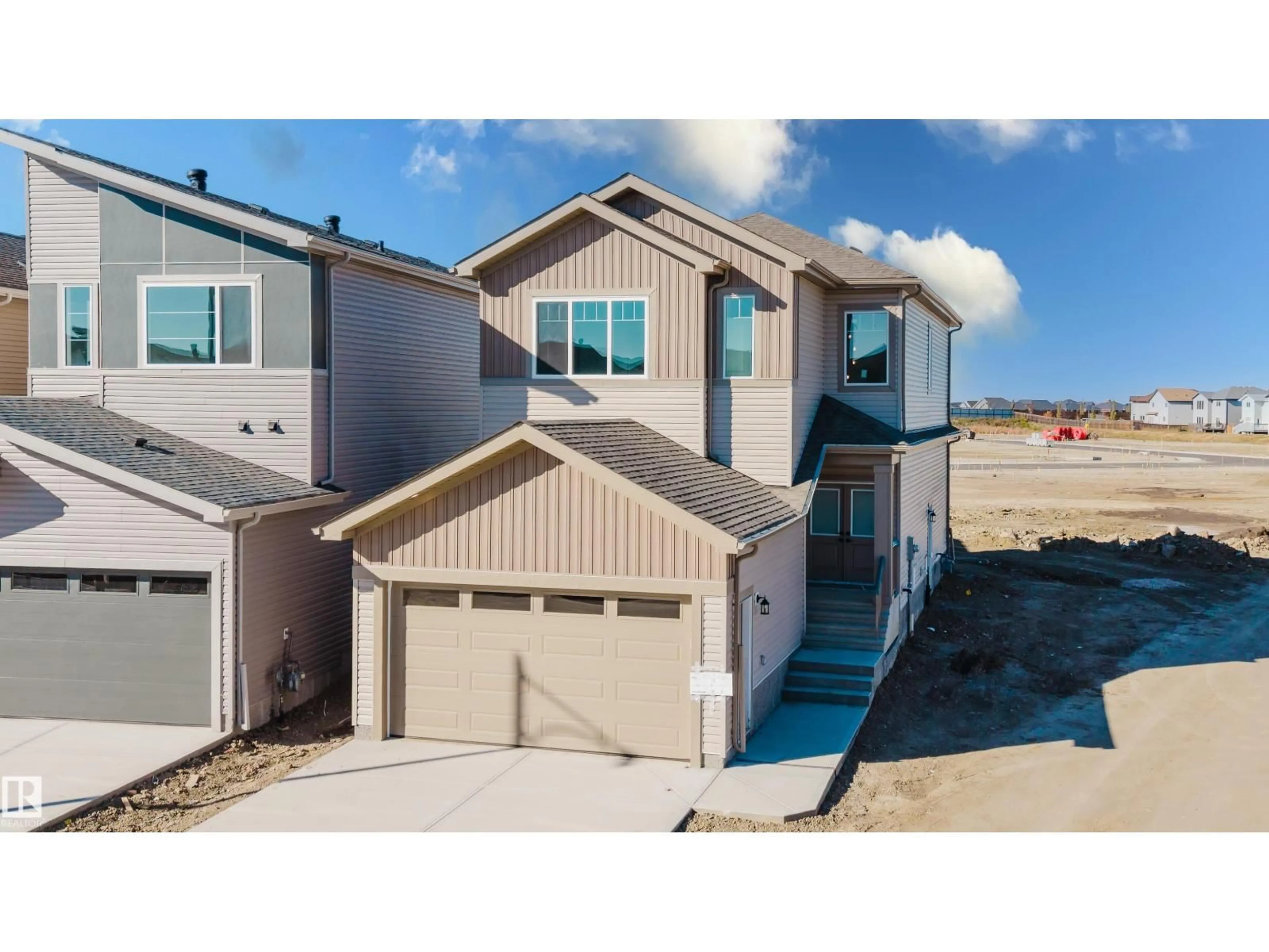 Home with vinyl exterior material, street for 343 MUNN WY, Leduc Alberta T9E0S9
