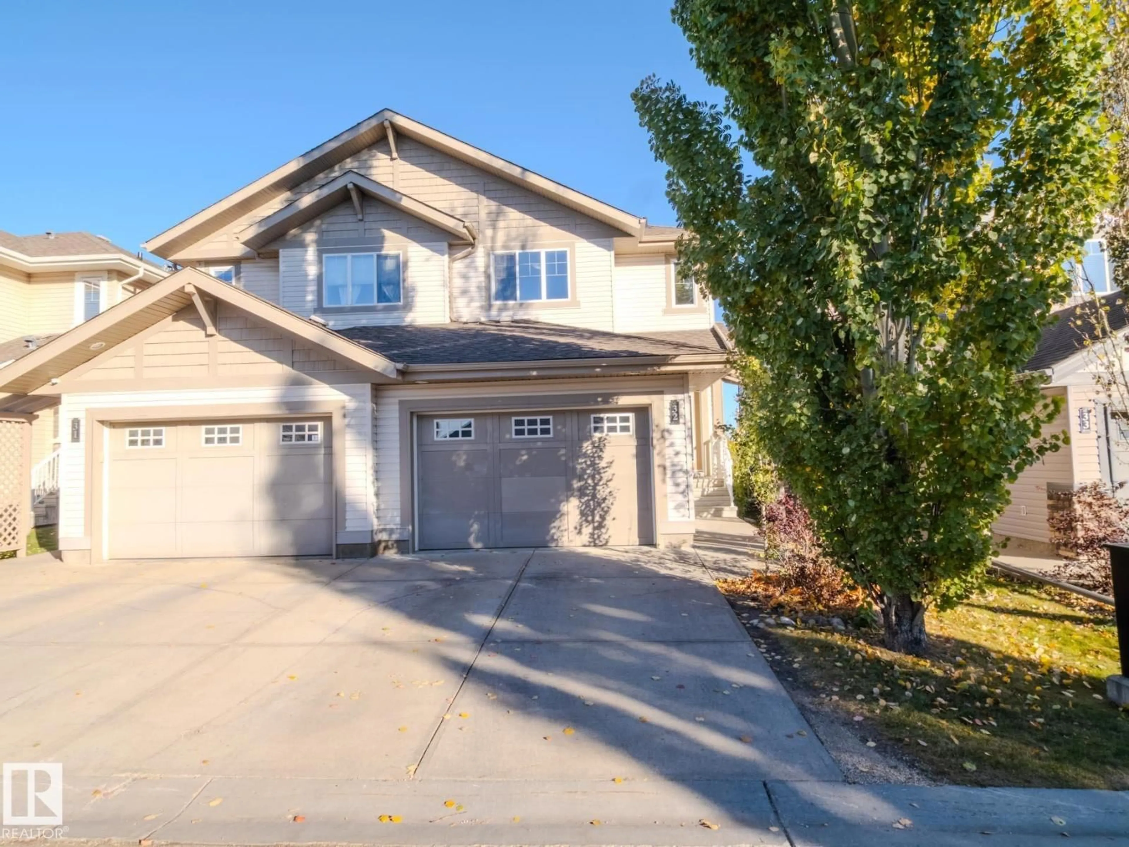 Home with vinyl exterior material, street for #32 - 1901 126 ST SW, Edmonton Alberta T6W0R9