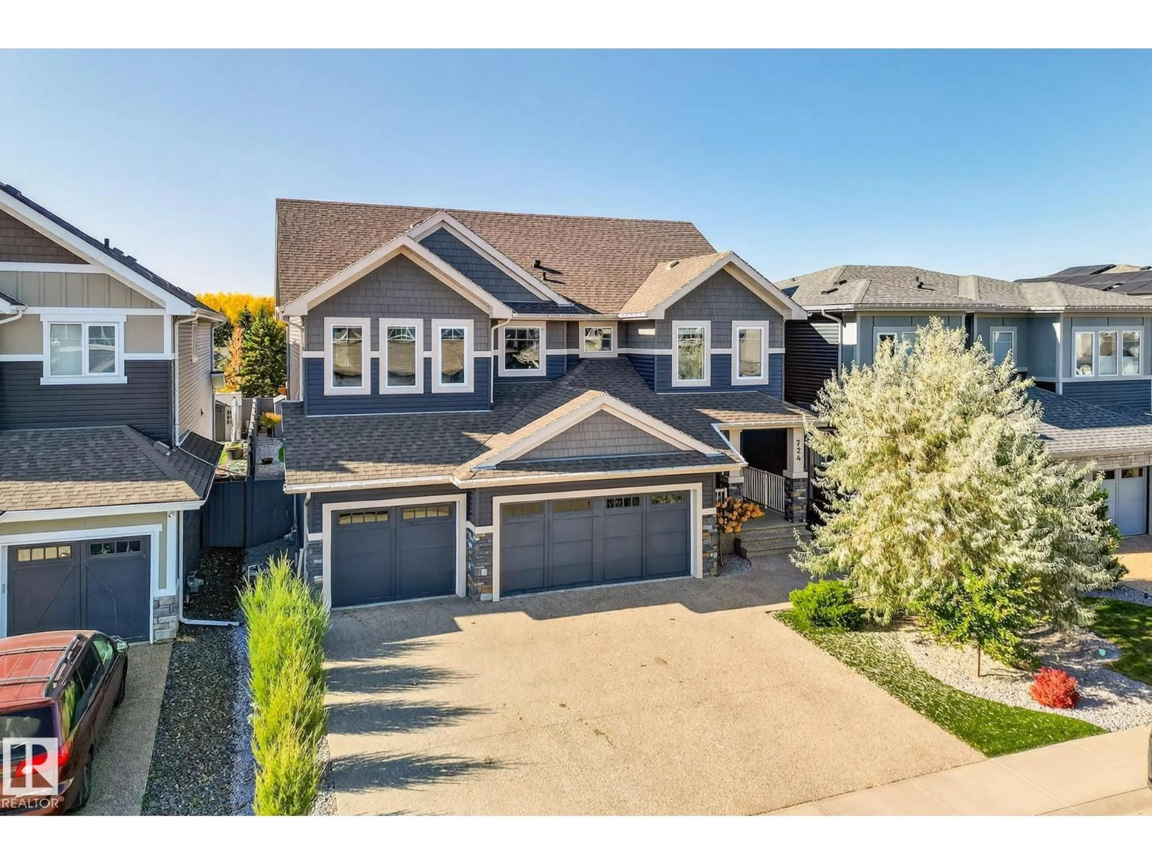 A pic from outside/outdoor area/front of a property/back of a property/a pic from drone, street for 724 180 ST, Edmonton Alberta T6W2S8