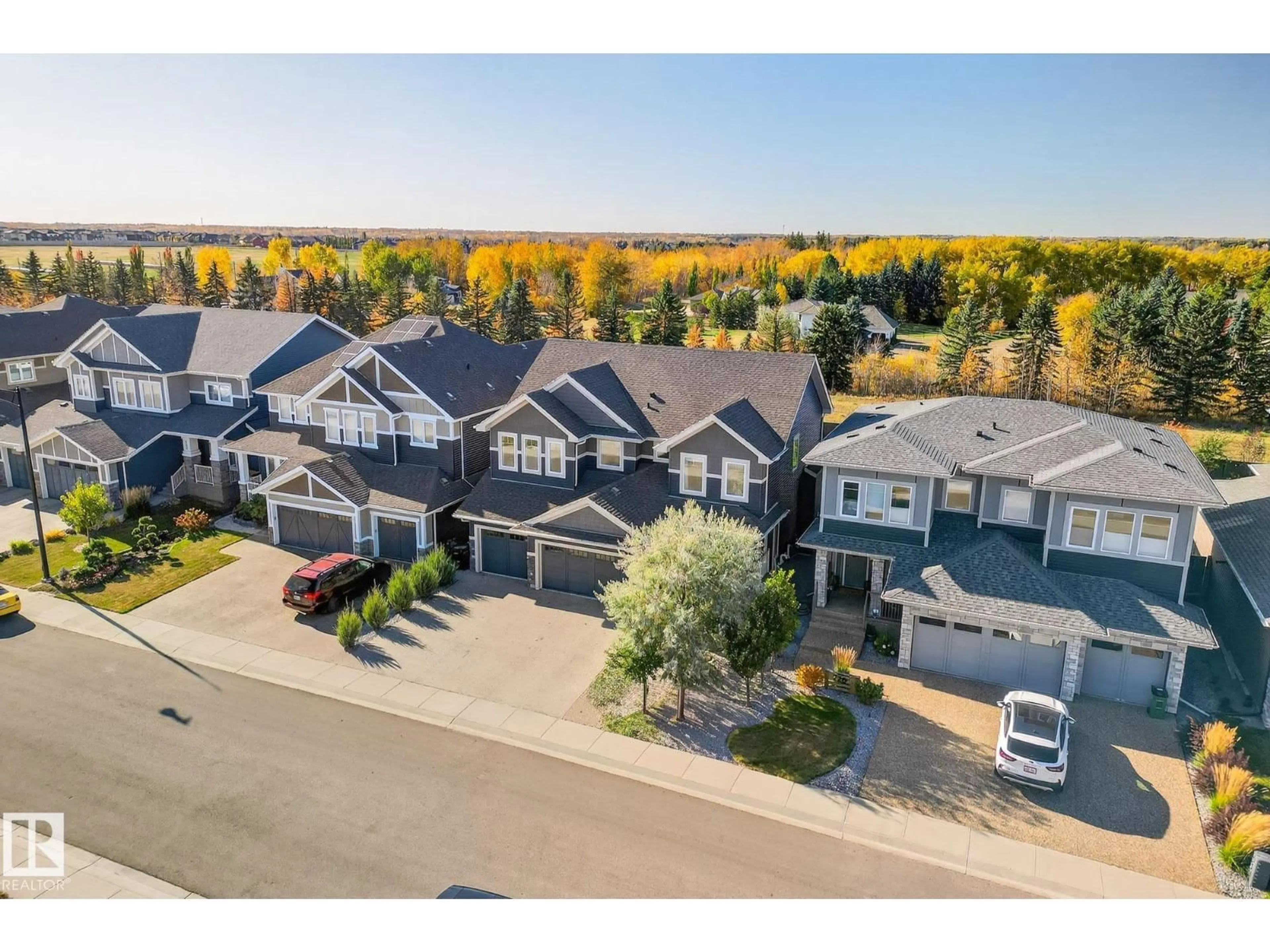 A pic from outside/outdoor area/front of a property/back of a property/a pic from drone, mountain view for 724 180 ST, Edmonton Alberta T6W2S8