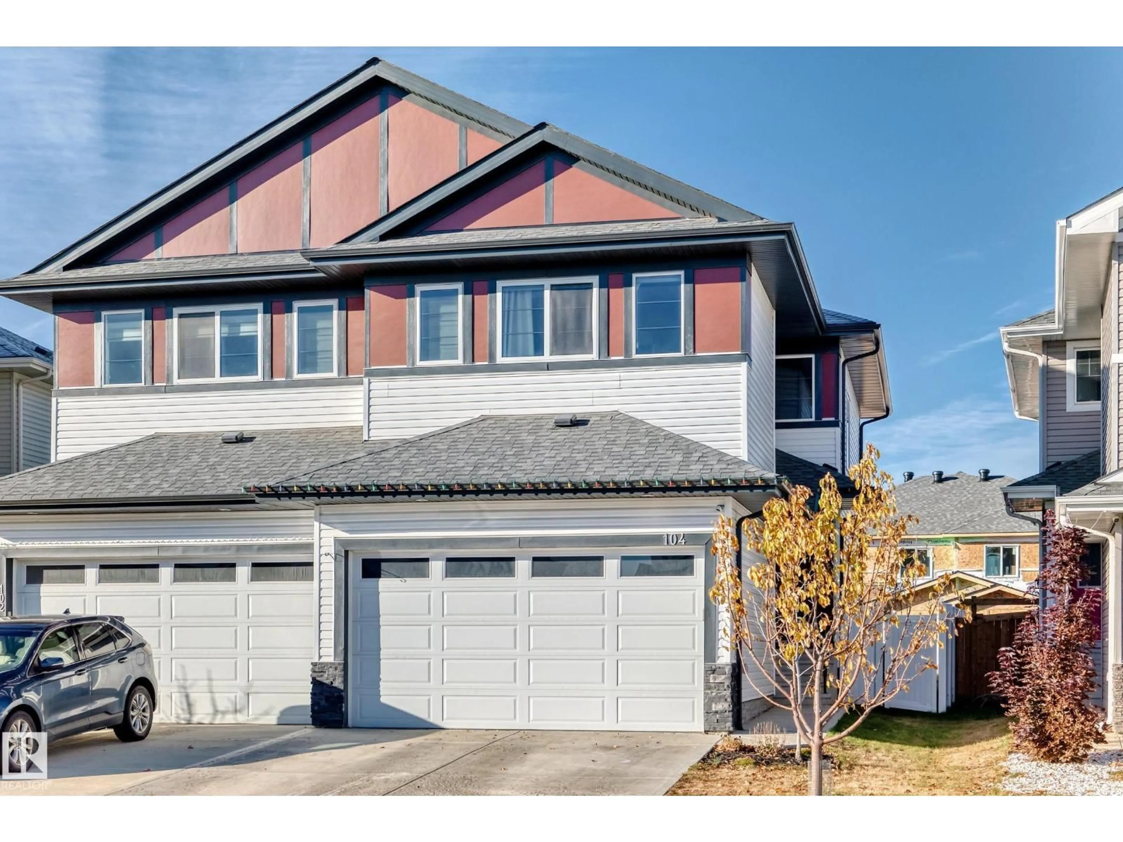 Home with vinyl exterior material, street for 104 WILLOW LI, Fort Saskatchewan Alberta T8L0W8