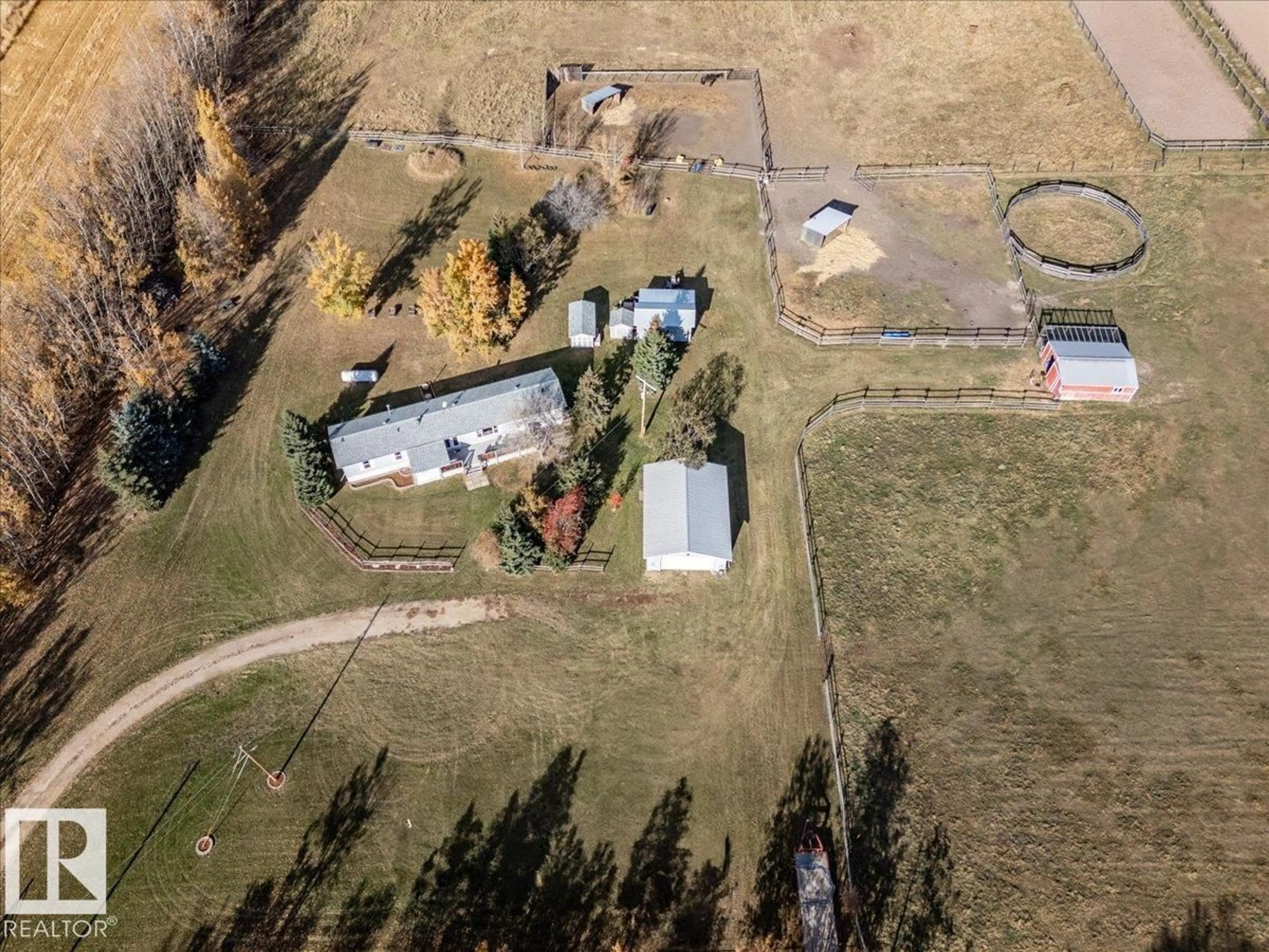 A pic from outside/outdoor area/front of a property/back of a property/a pic from drone, unknown for 28154 TWP RD, Rural Leduc County Alberta T0C2P0