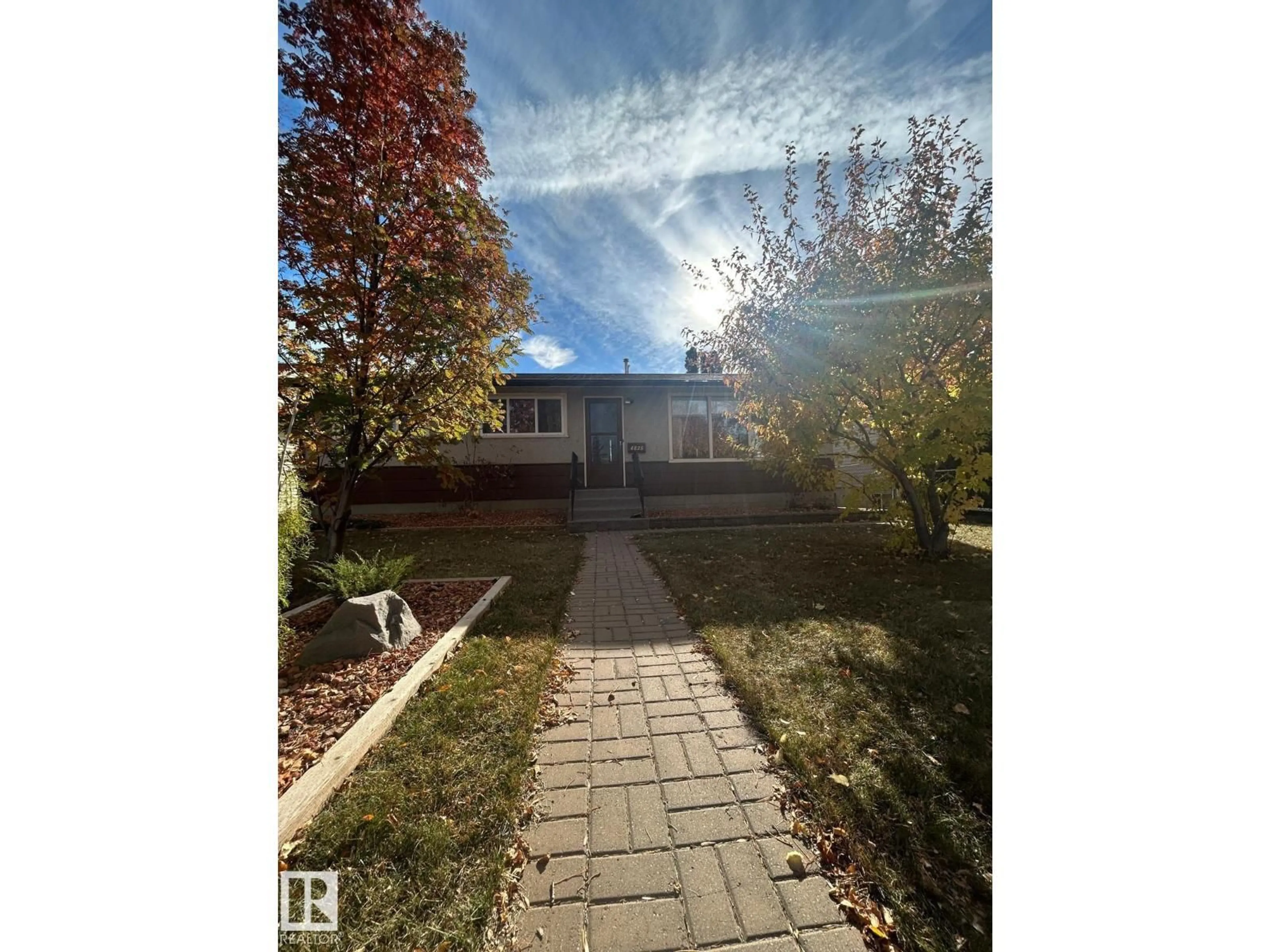 A pic from outside/outdoor area/front of a property/back of a property/a pic from drone, street for 4825 117 AV, Edmonton Alberta T5W0Y9