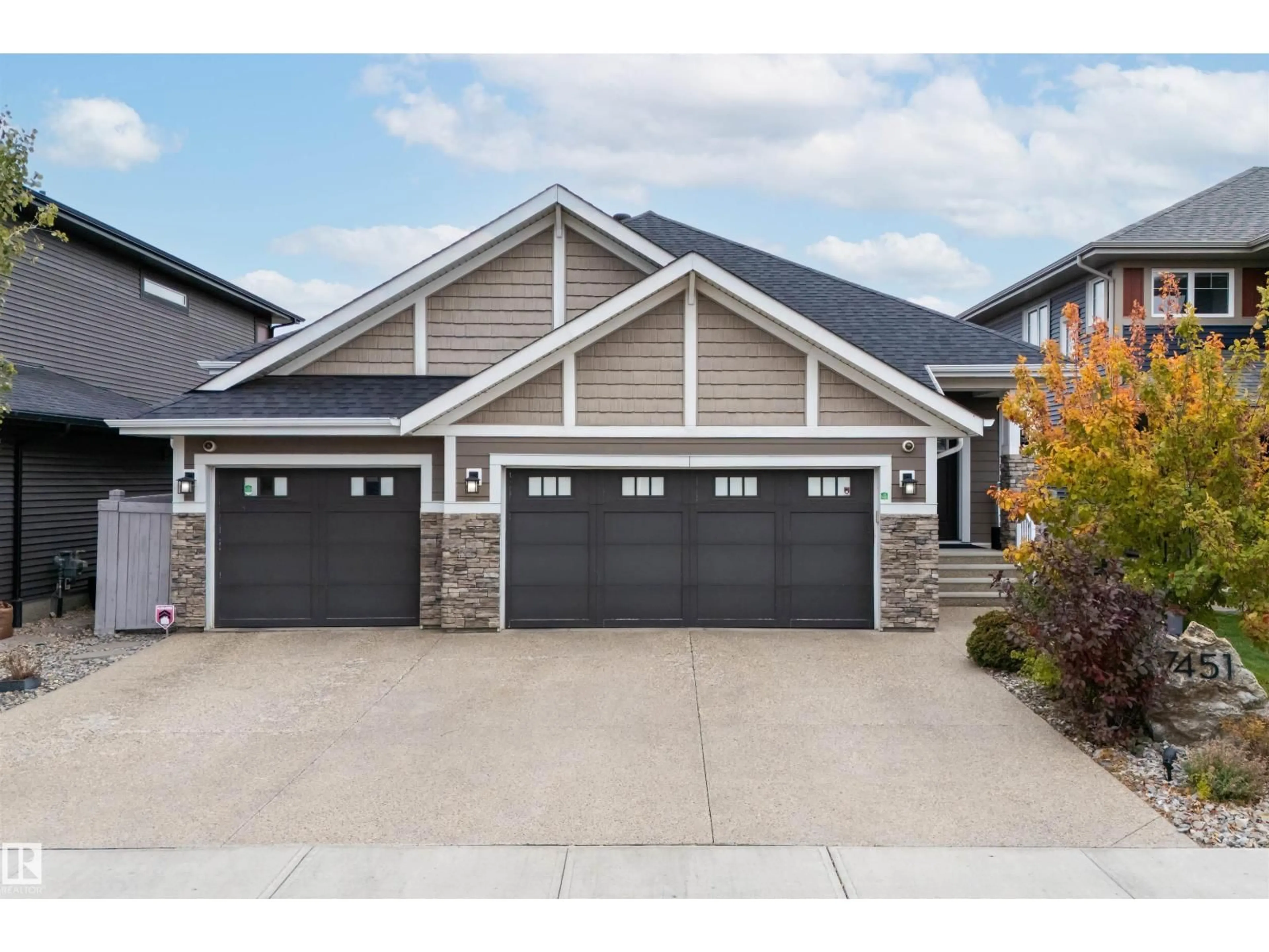 Home with vinyl exterior material, street for 7451 COLONEL MEWBURN RD, Edmonton Alberta T5E6V6