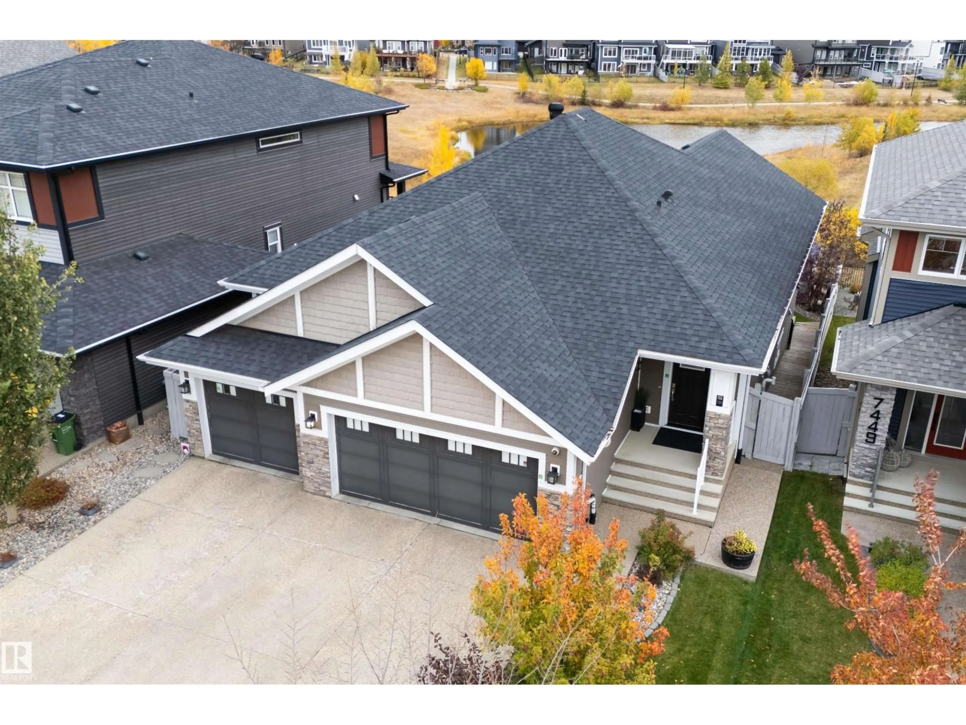 A pic from outside/outdoor area/front of a property/back of a property/a pic from drone, street for 7451 COLONEL MEWBURN RD, Edmonton Alberta T5E6V6