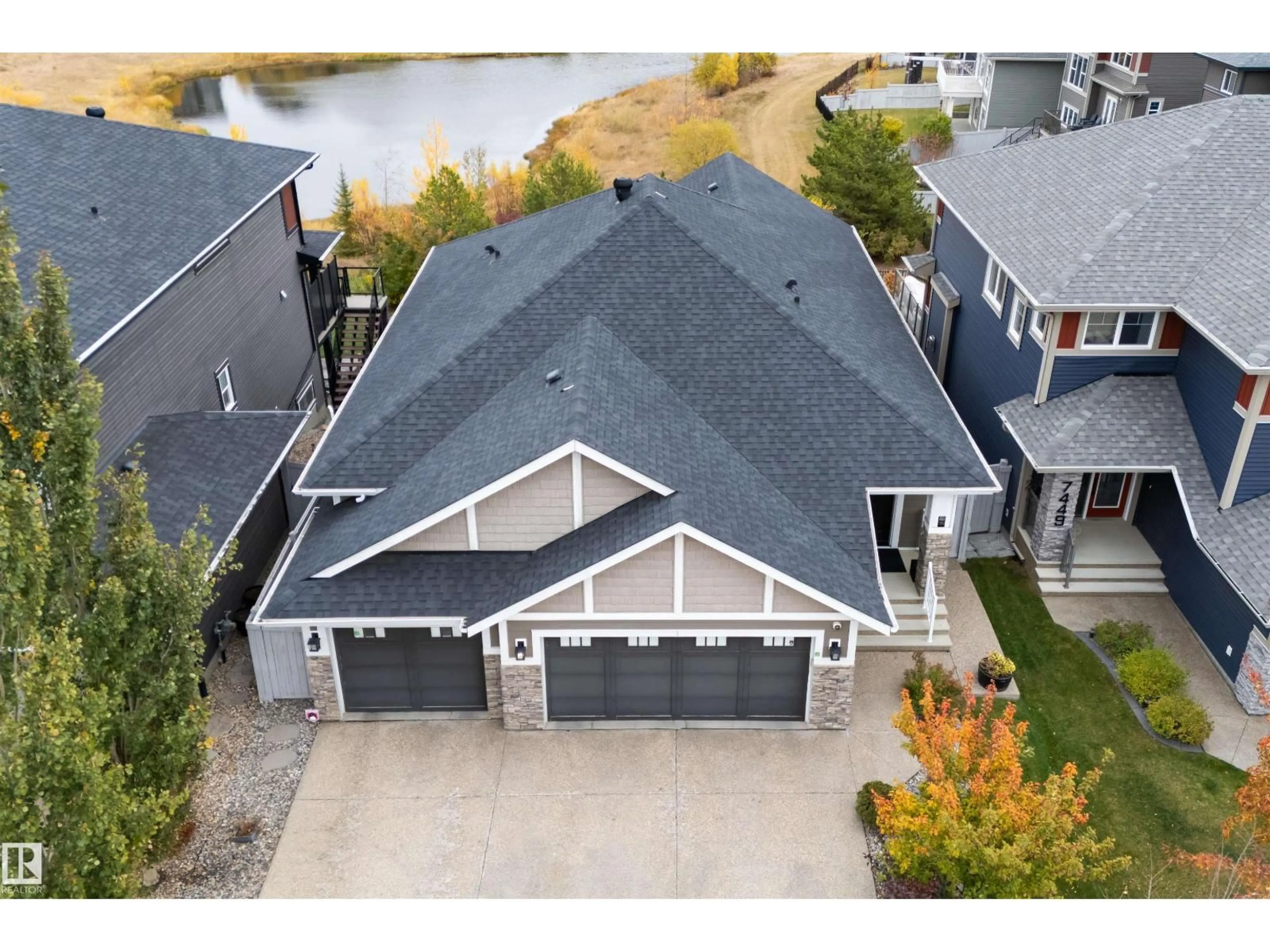 A pic from outside/outdoor area/front of a property/back of a property/a pic from drone, water/lake/river/ocean view for 7451 COLONEL MEWBURN RD, Edmonton Alberta T5E6V6
