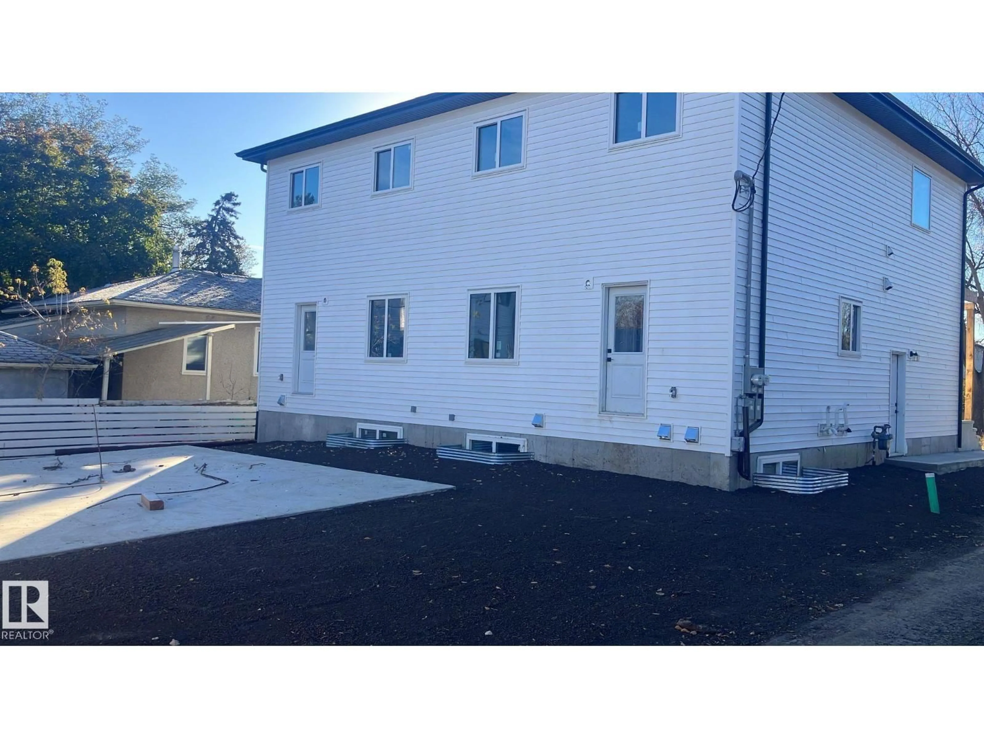 A pic from outside/outdoor area/front of a property/back of a property/a pic from drone, building for NW - 12516 114 AV, Edmonton Alberta T5M2X6