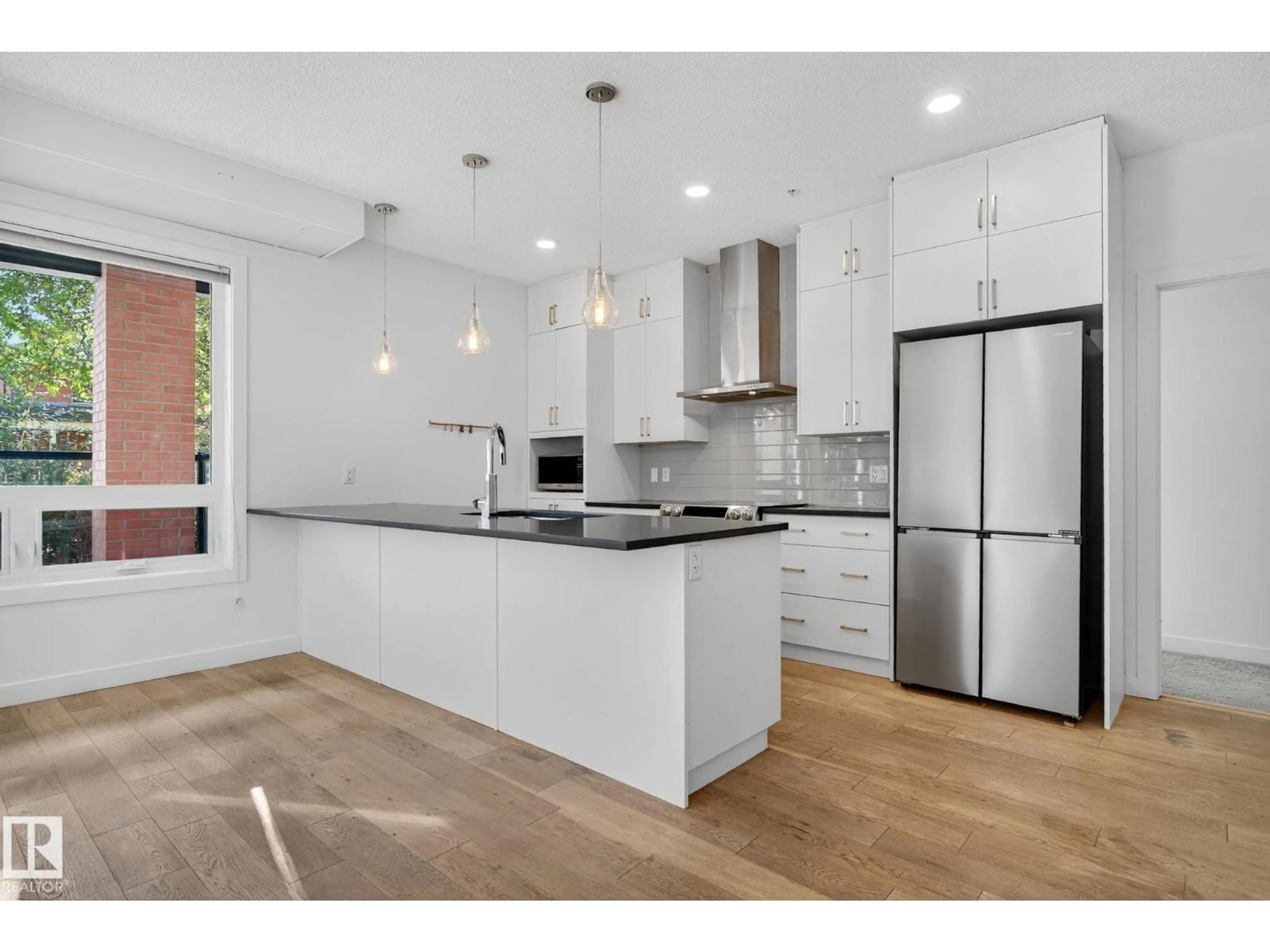 Open concept kitchen, unknown for #103 - 10606 84 AV, Edmonton Alberta T6E2H6