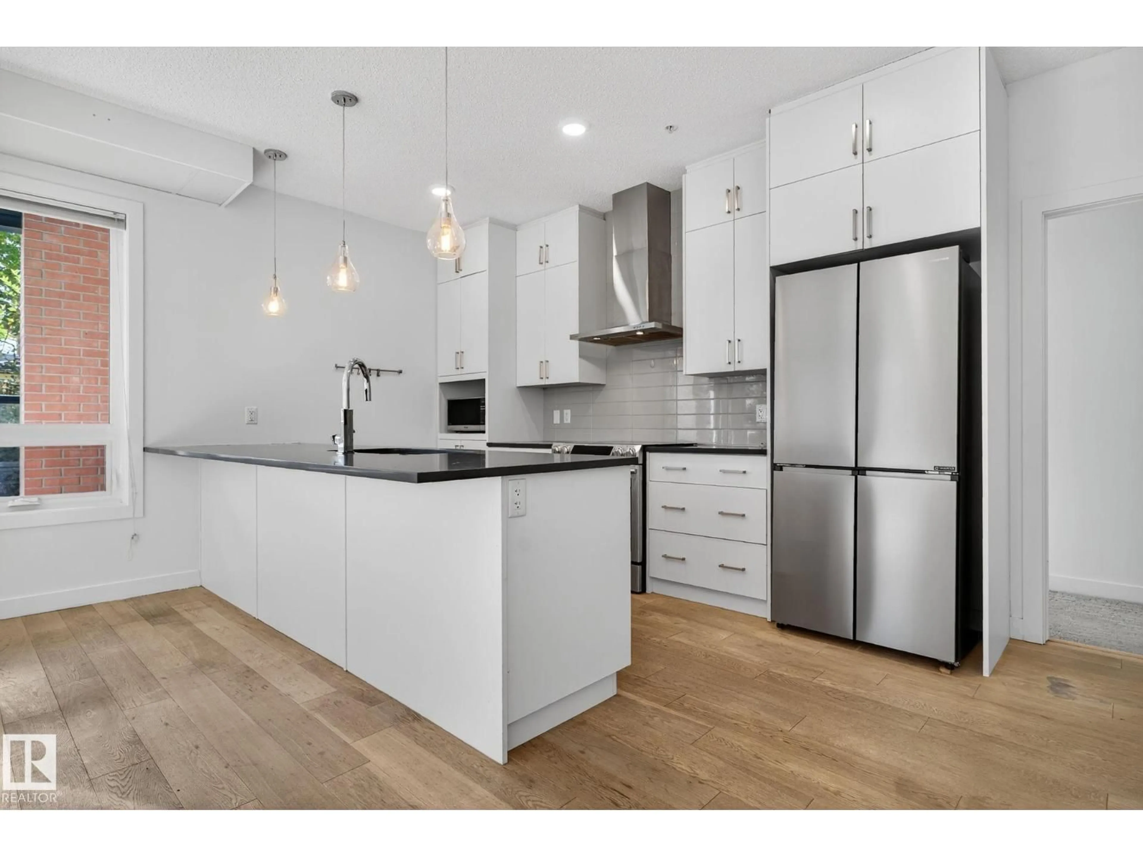 Open concept kitchen, unknown for #103 - 10606 84 AV, Edmonton Alberta T6E2H6