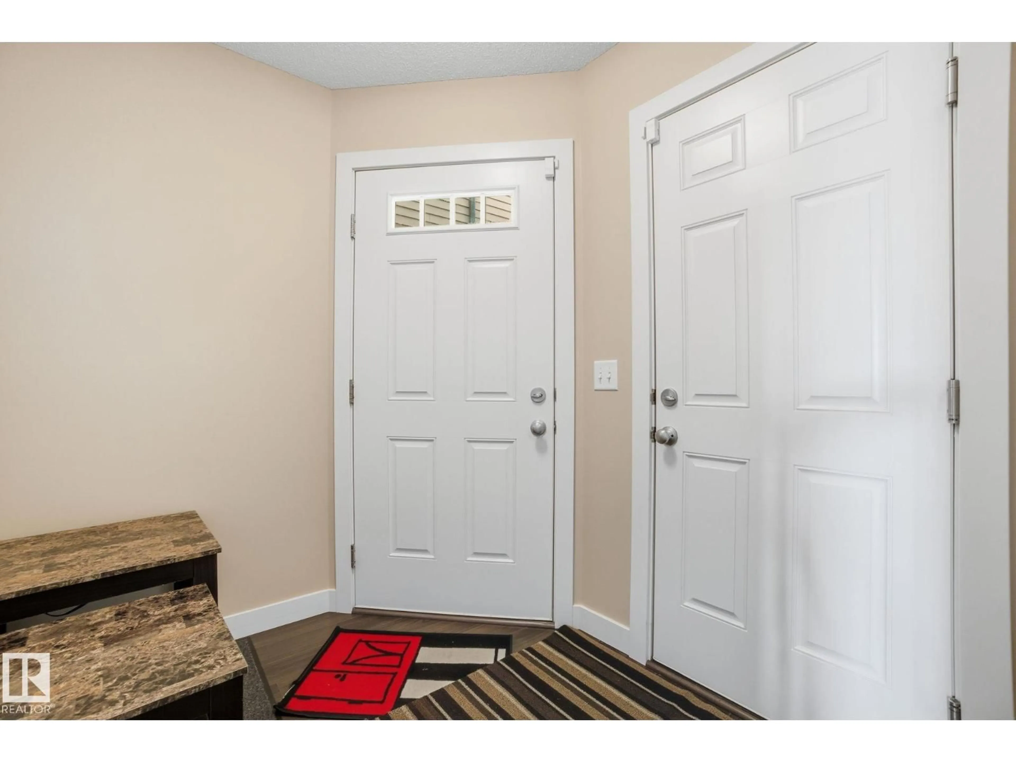 Indoor entryway for 3217 11 AV, Edmonton Alberta T6T2C5