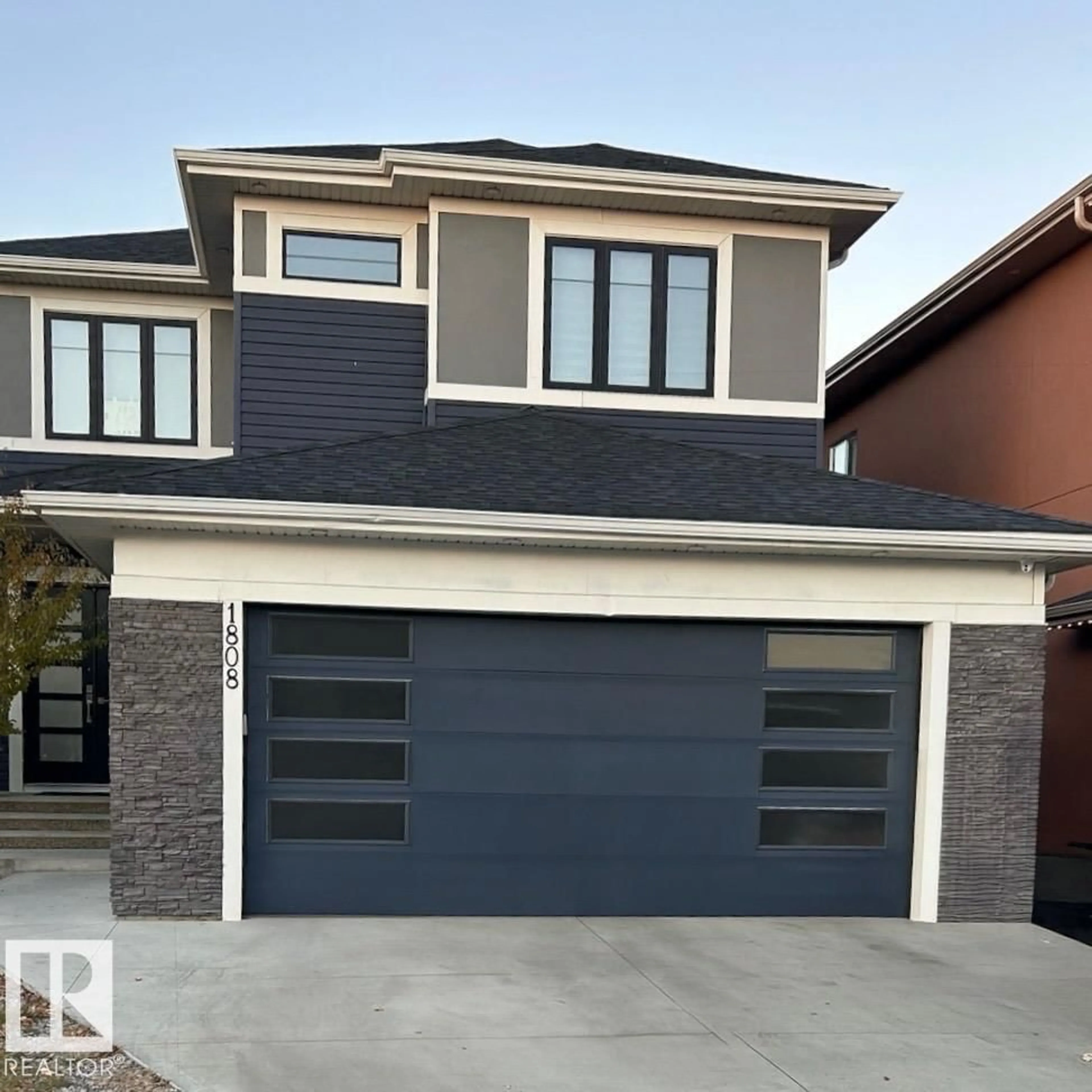 Home with brick exterior material, street for 1808 20 AV, Edmonton Alberta T6T2K9