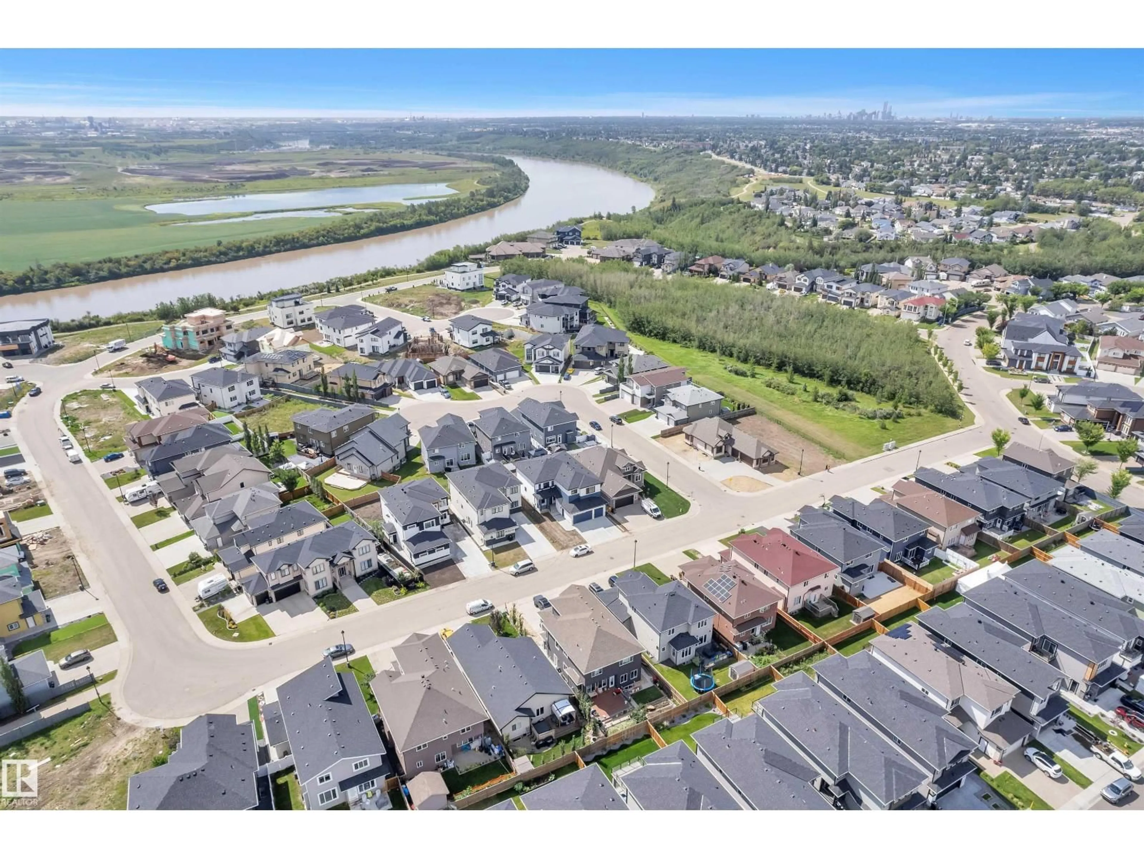A pic from outside/outdoor area/front of a property/back of a property/a pic from drone, water/lake/river/ocean view for 619 FRASER VISTA VS, Edmonton Alberta T5Y0V4
