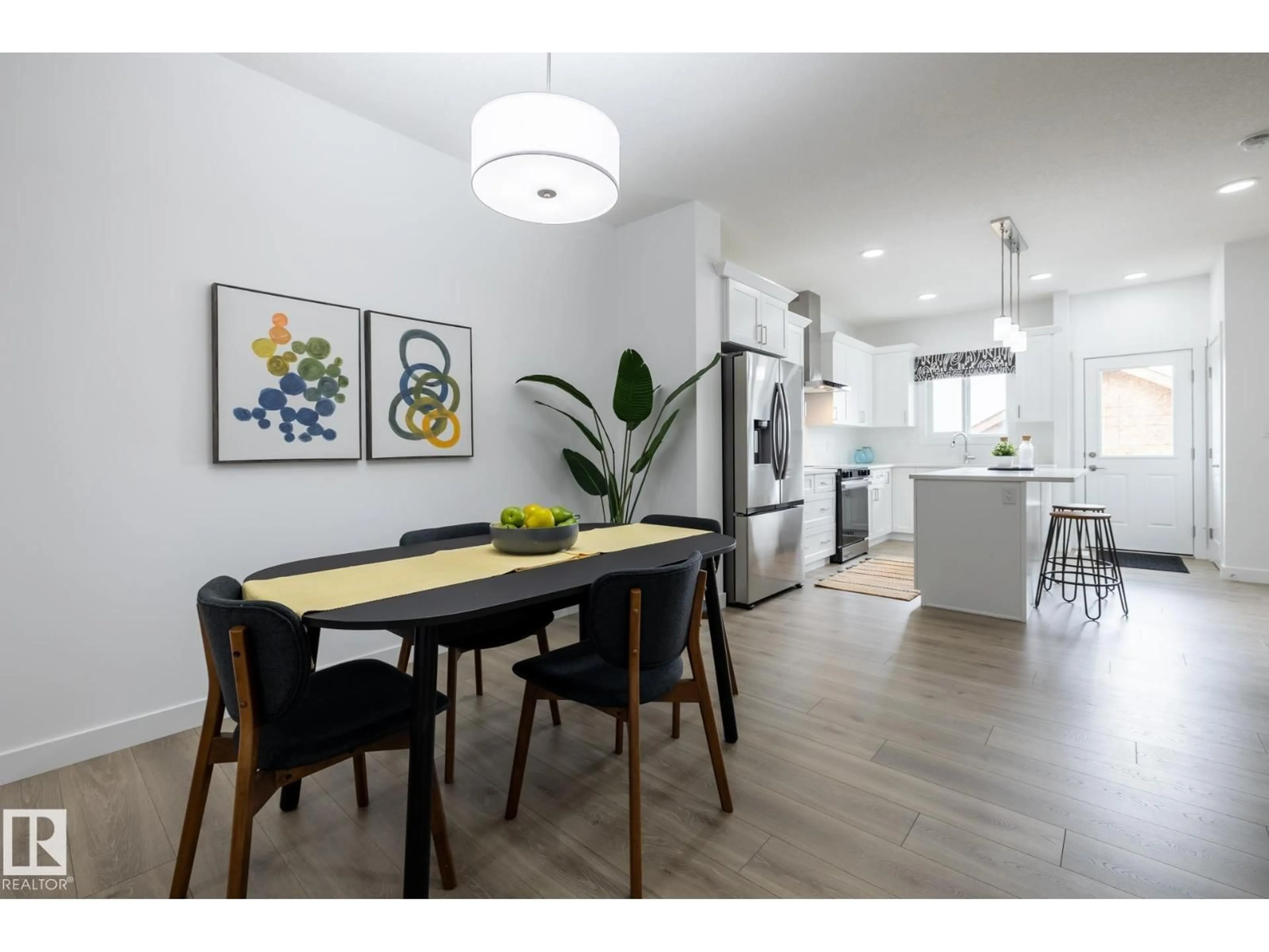 Open concept kitchen, wood/laminate floor for 1288 KESWICK DR, Edmonton Alberta T6W5P2
