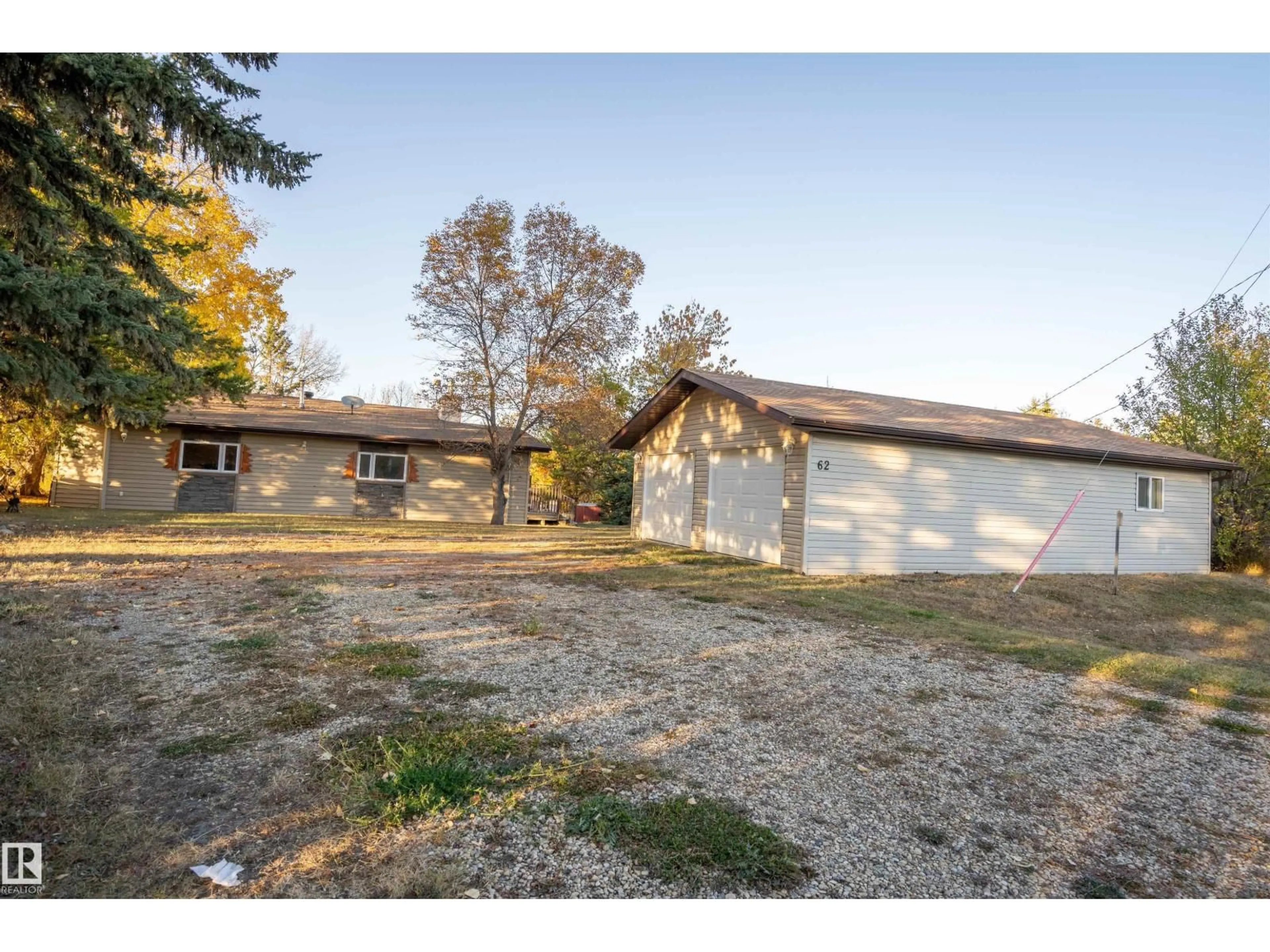 A pic from outside/outdoor area/front of a property/back of a property/a pic from drone, street for 62 BUSKMOSE DR, Rural Wetaskiwin County Alberta T0C2V0