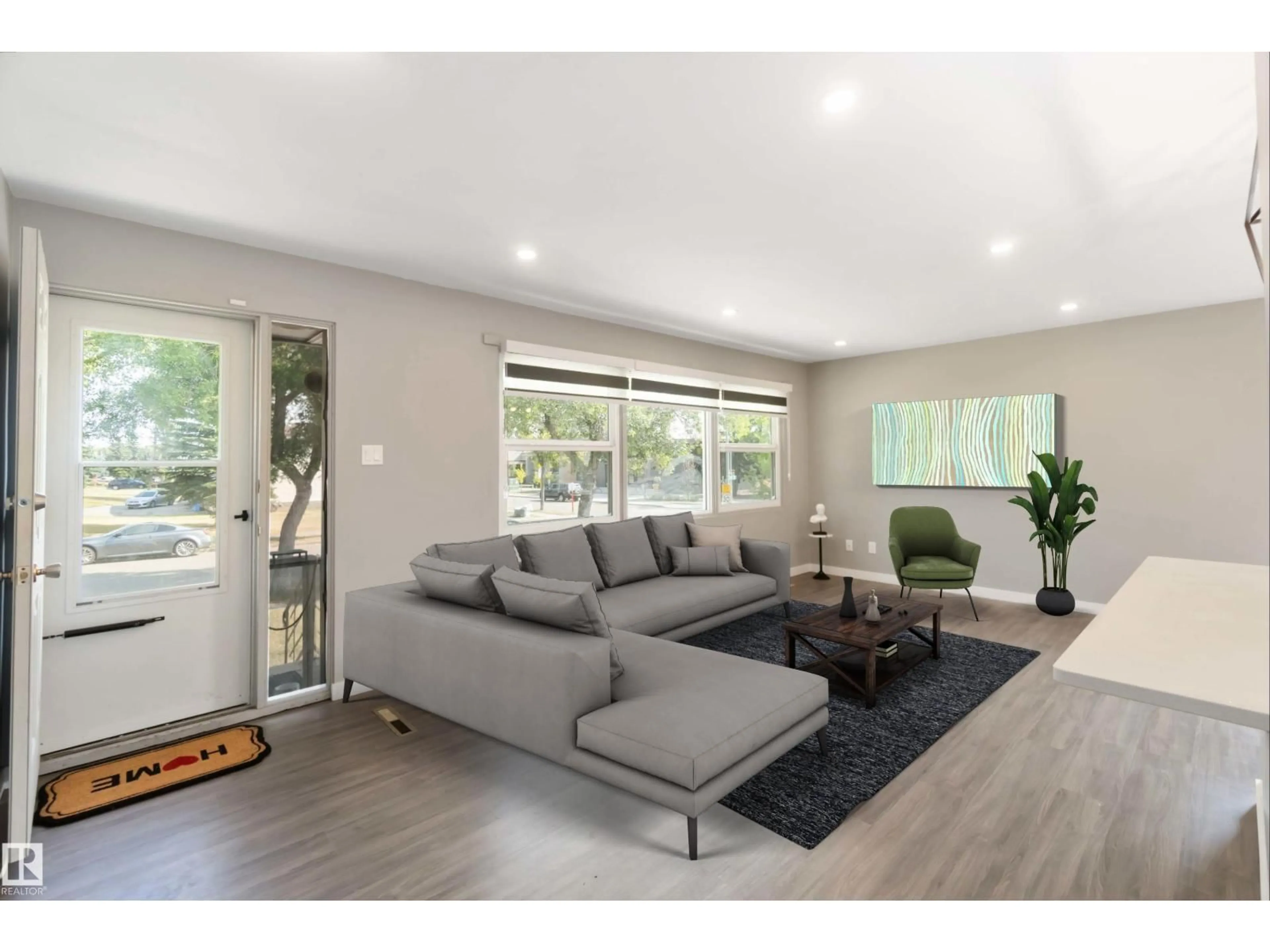 Living room with furniture, wood/laminate floor for 12268 131 ST, Edmonton Alberta T5L1M9