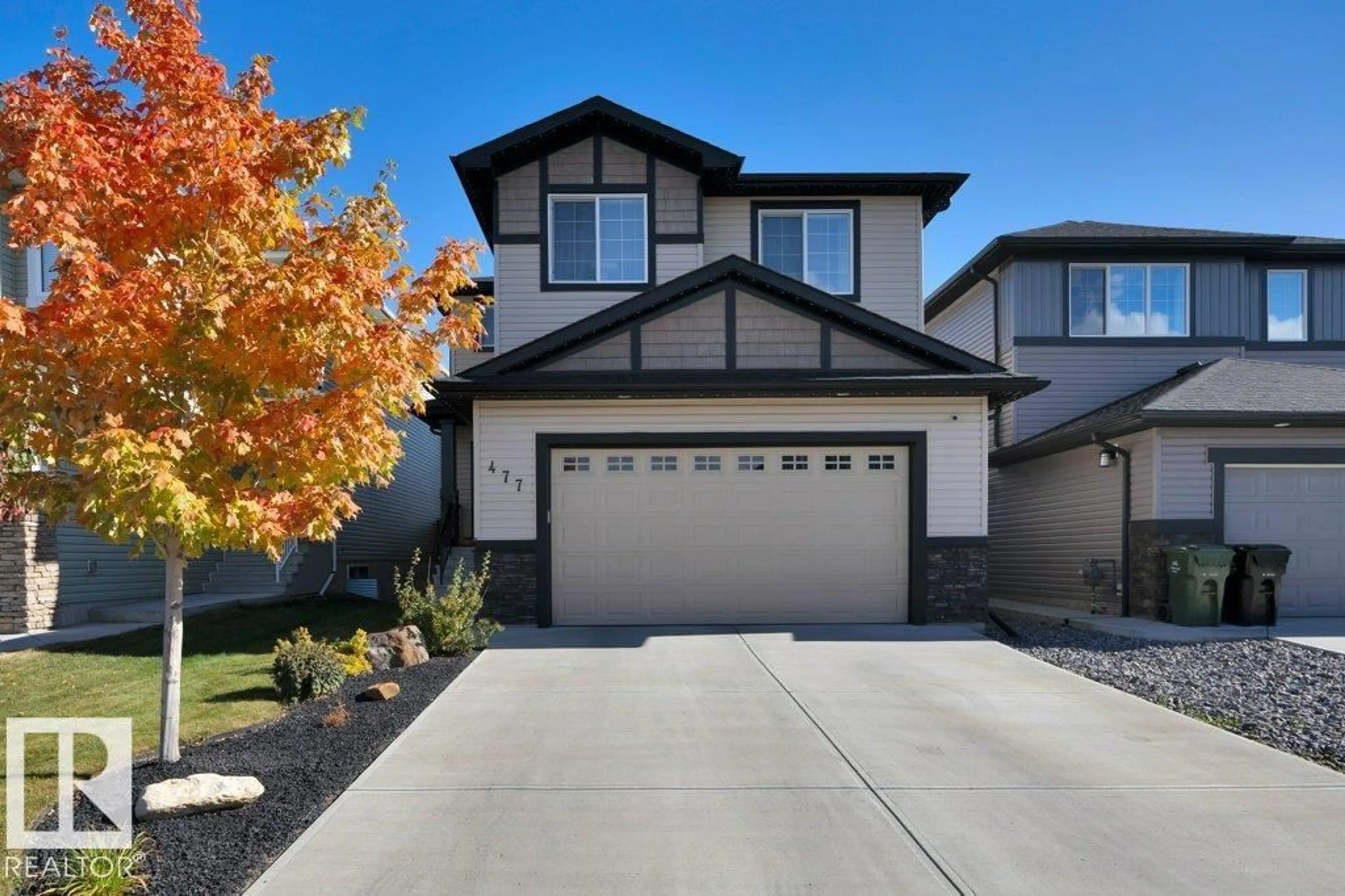 Home with vinyl exterior material, street for 477 ROBERTS CR, Leduc Alberta T9E1K9