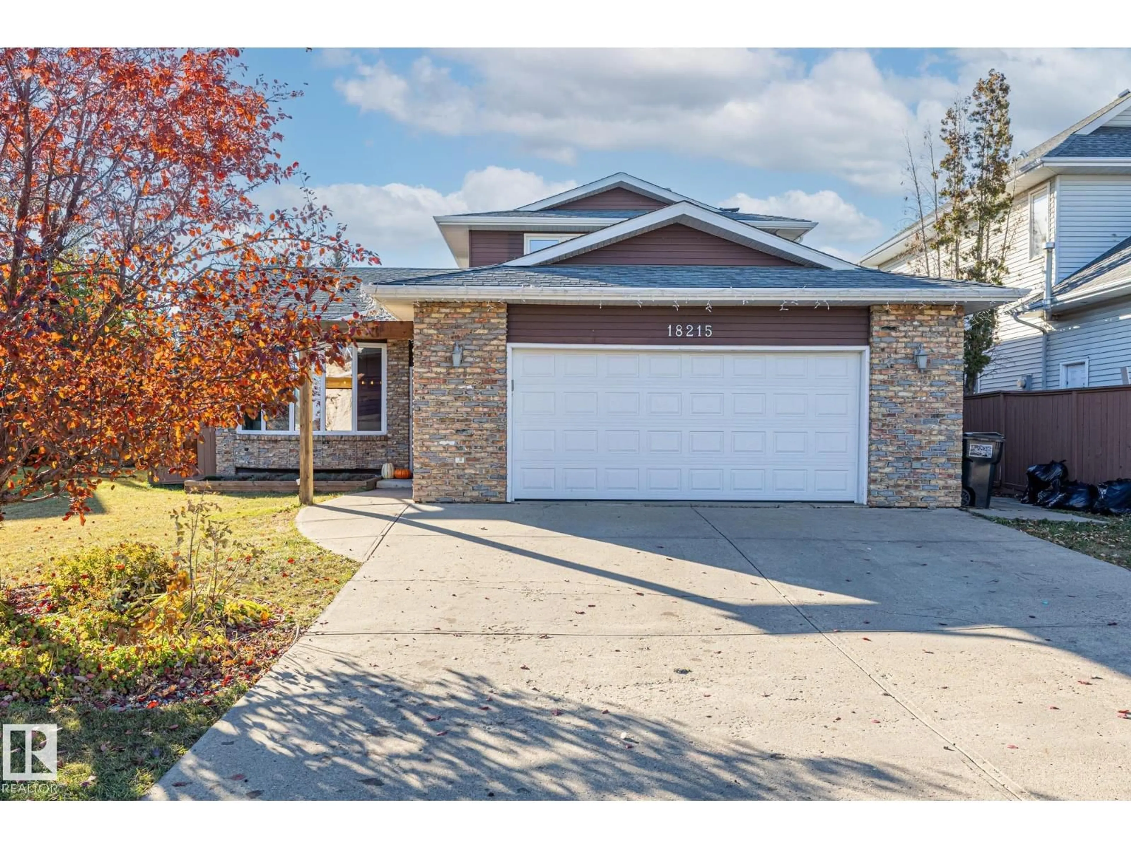 Home with brick exterior material, street for NW - 18215 62B AV, Edmonton Alberta T5T3J9