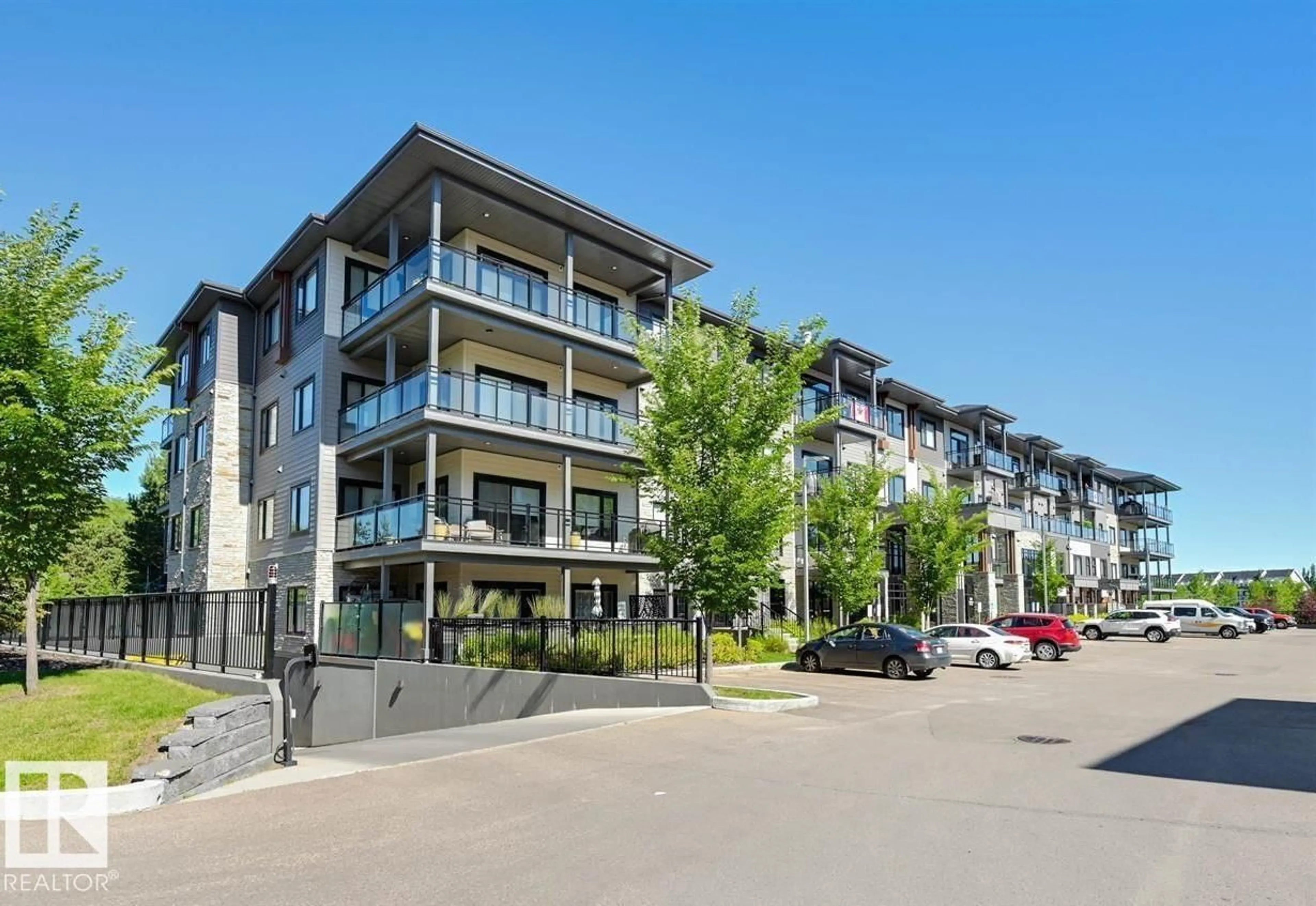 A pic from outside/outdoor area/front of a property/back of a property/a pic from drone, street for 528 - 206 GRIESBACH PARADE, Edmonton Alberta T5E6X2
