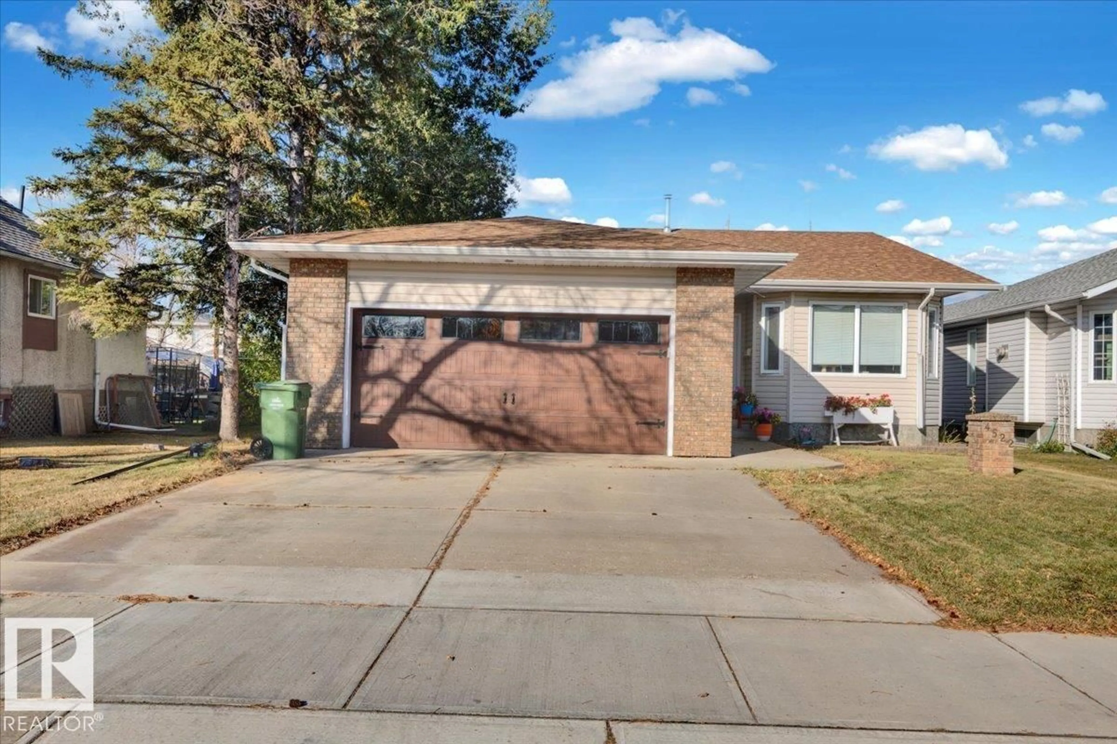 Home with vinyl exterior material, street for 4522 53 AV, Leduc Alberta T9E5X1