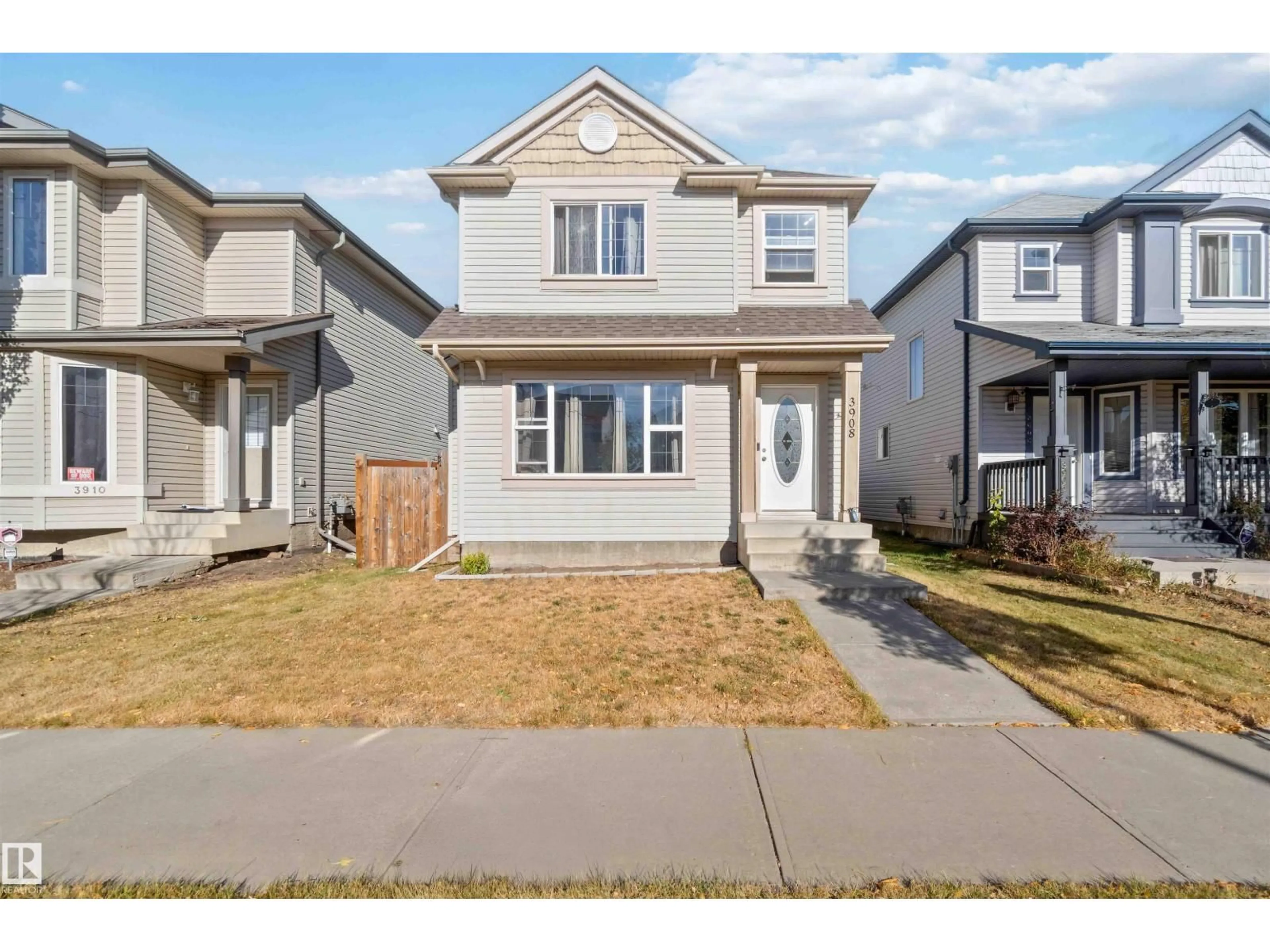 Home with vinyl exterior material, street for NW - 3908 161 AV, Edmonton Alberta T5Y3J8