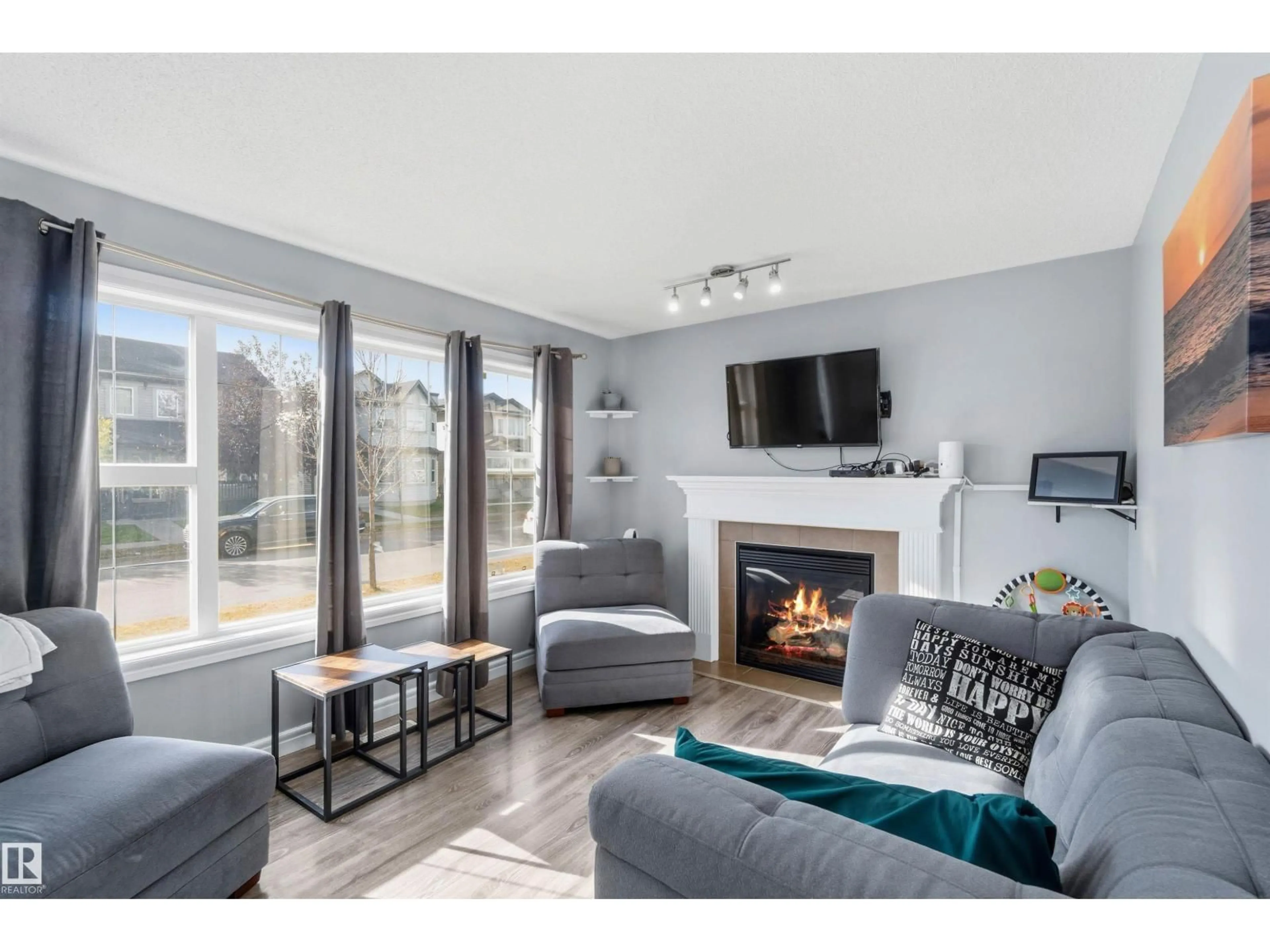 Living room with furniture, unknown for NW - 3908 161 AV, Edmonton Alberta T5Y3J8