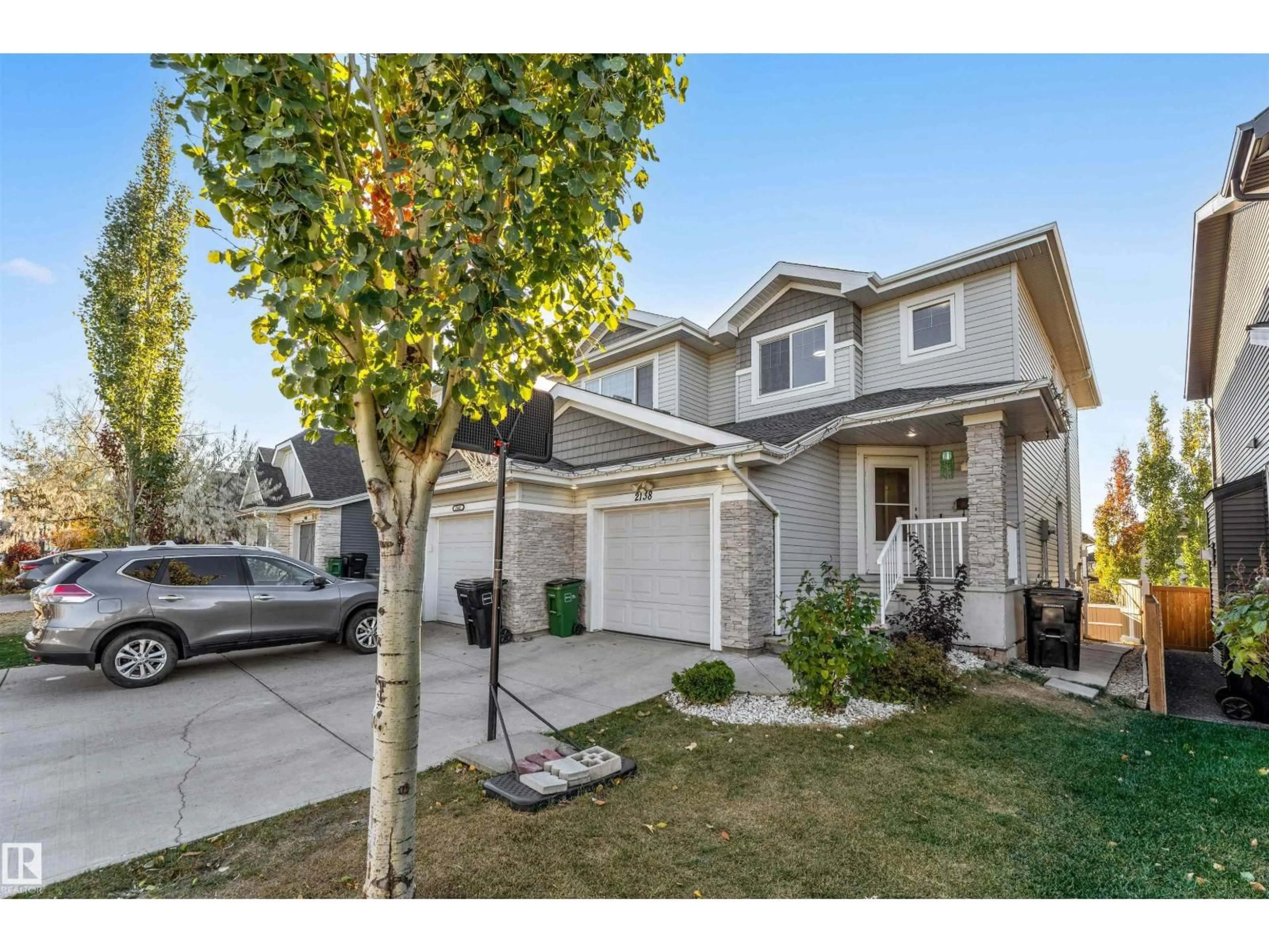 Home with vinyl exterior material, street for SW - 2138 52A ST, Edmonton Alberta T6X1X4