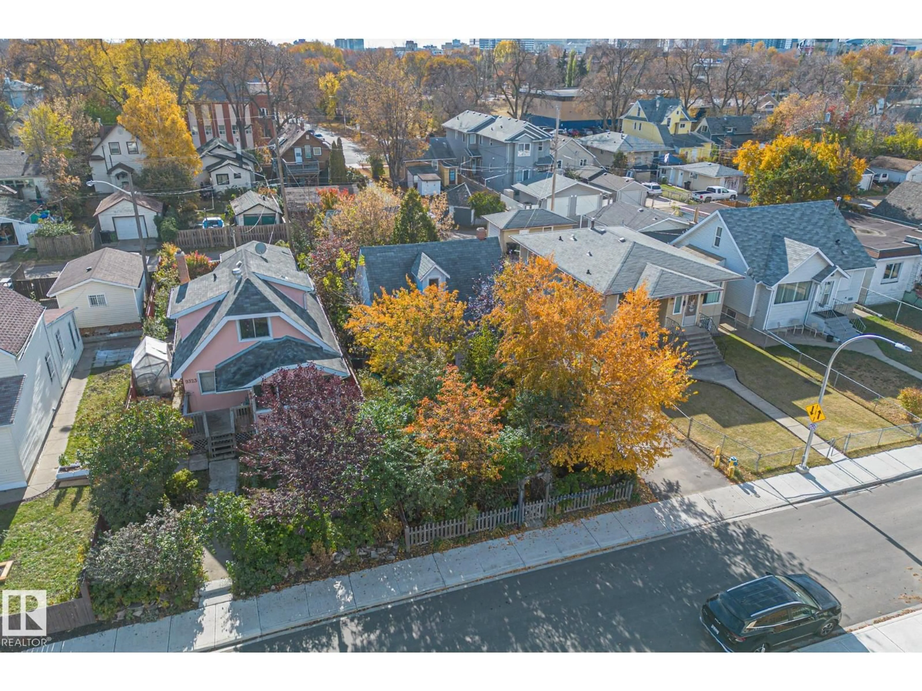 A pic from outside/outdoor area/front of a property/back of a property/a pic from drone, street for 9325 110 AV, Edmonton Alberta T5H1H2