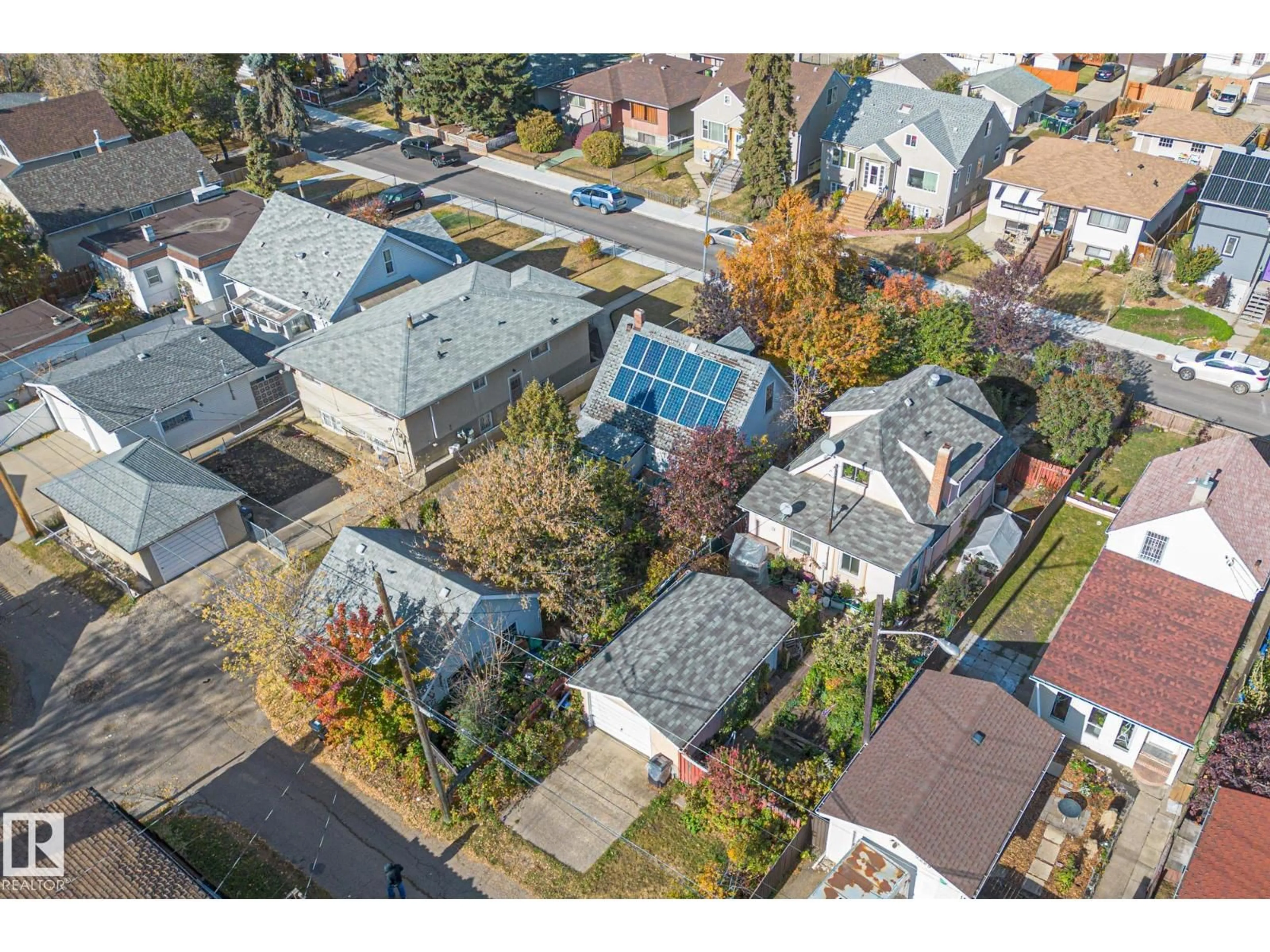A pic from outside/outdoor area/front of a property/back of a property/a pic from drone, street for 9325 110 AV, Edmonton Alberta T5H1H2
