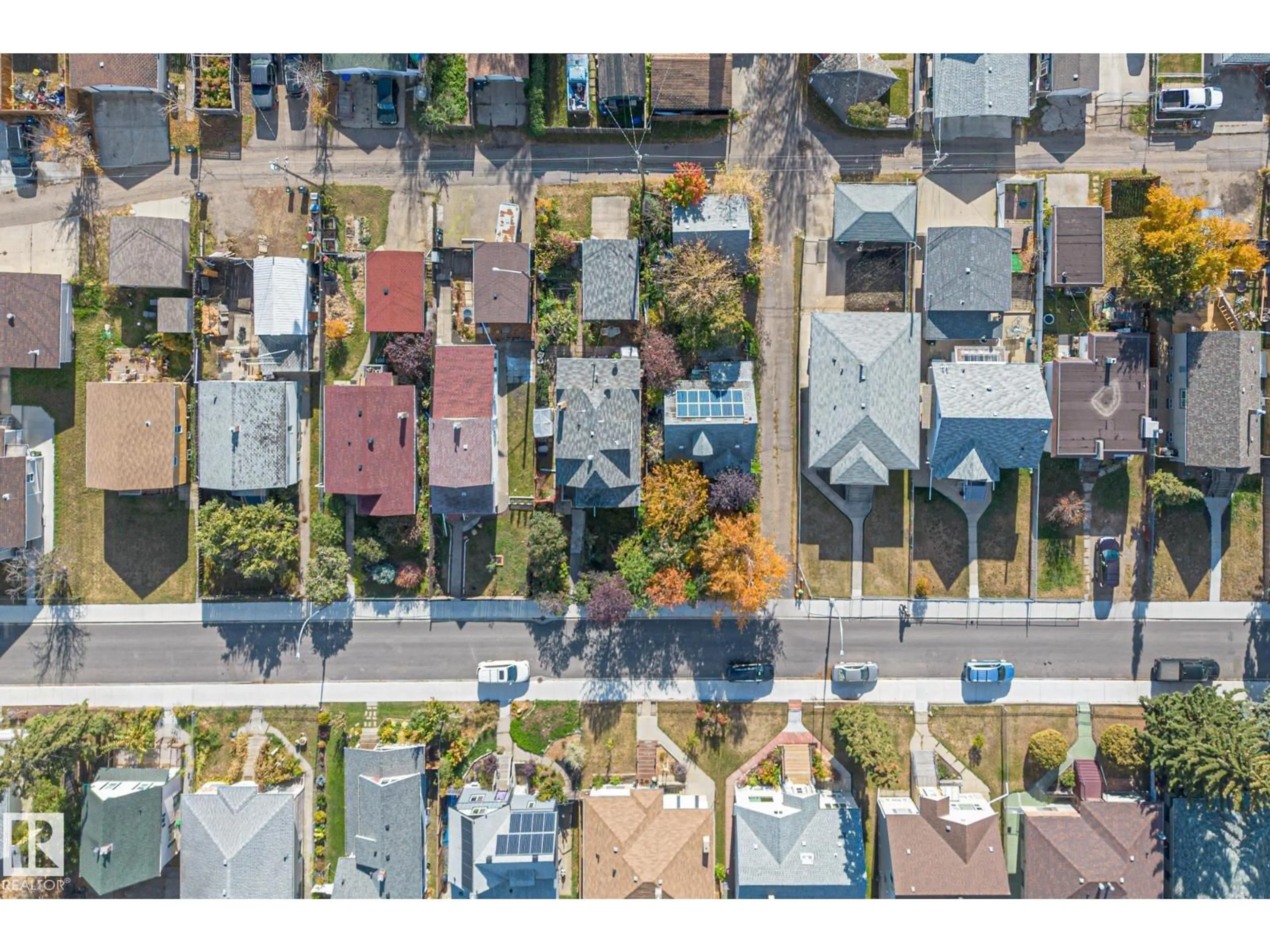 A pic from outside/outdoor area/front of a property/back of a property/a pic from drone, street for 9325 110 AV, Edmonton Alberta T5H1H2