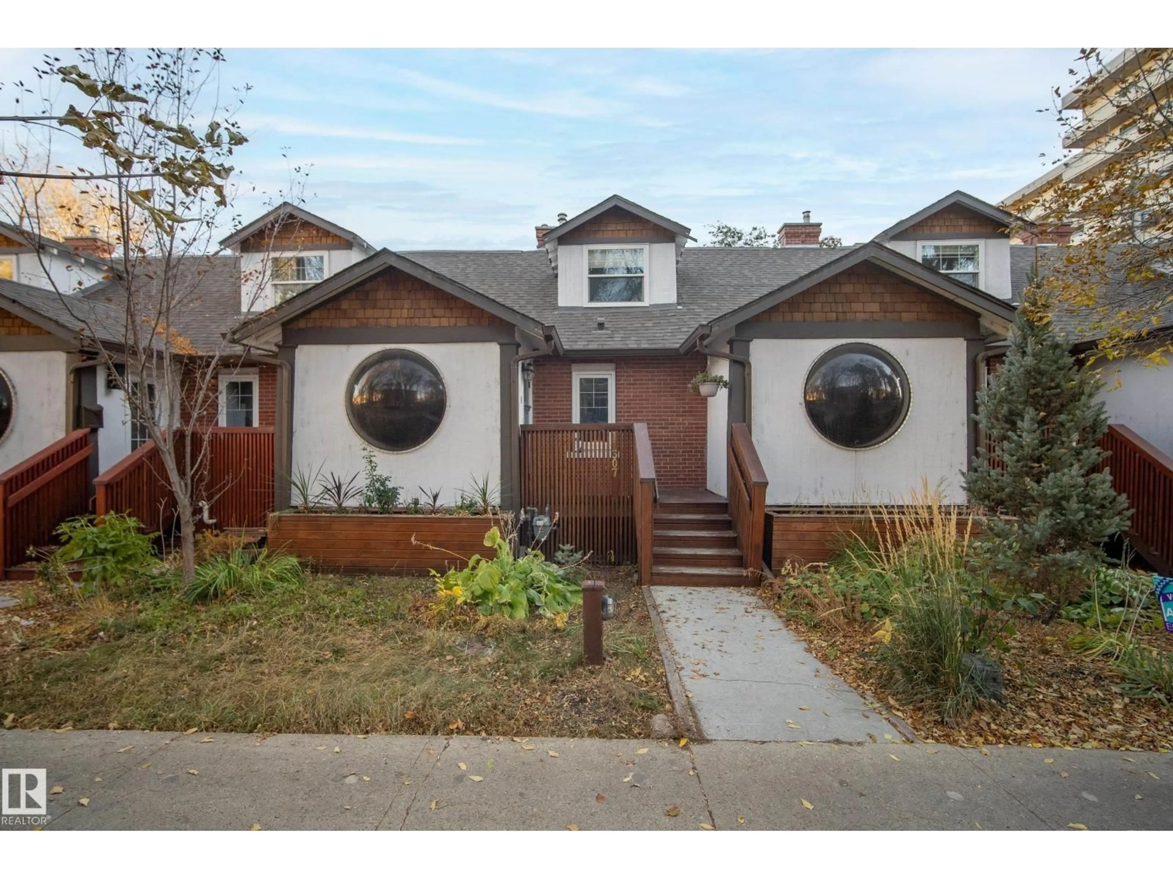 Home with brick exterior material, street for 11307 102 AV, Edmonton Alberta T5P0P6