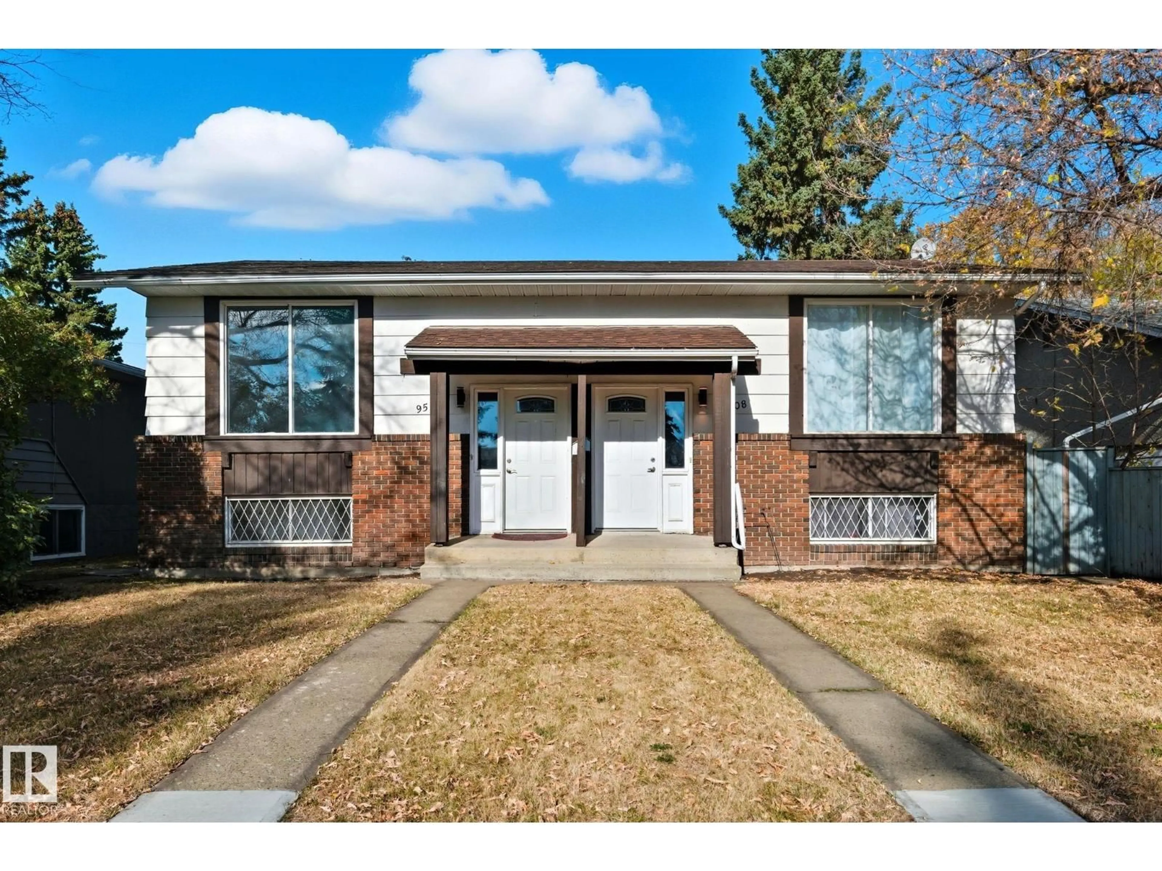 Home with brick exterior material, street for NW NW - 9508 9510 128 AV, Edmonton Alberta T5E0H6